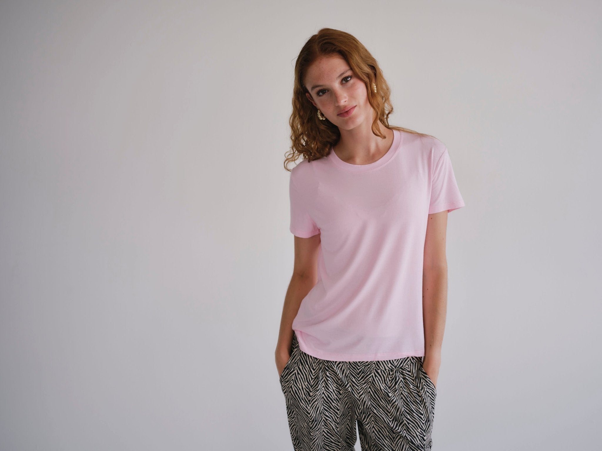 View our Butter Soft Summer Crew Neck Tee In Pink - by Tribute Store