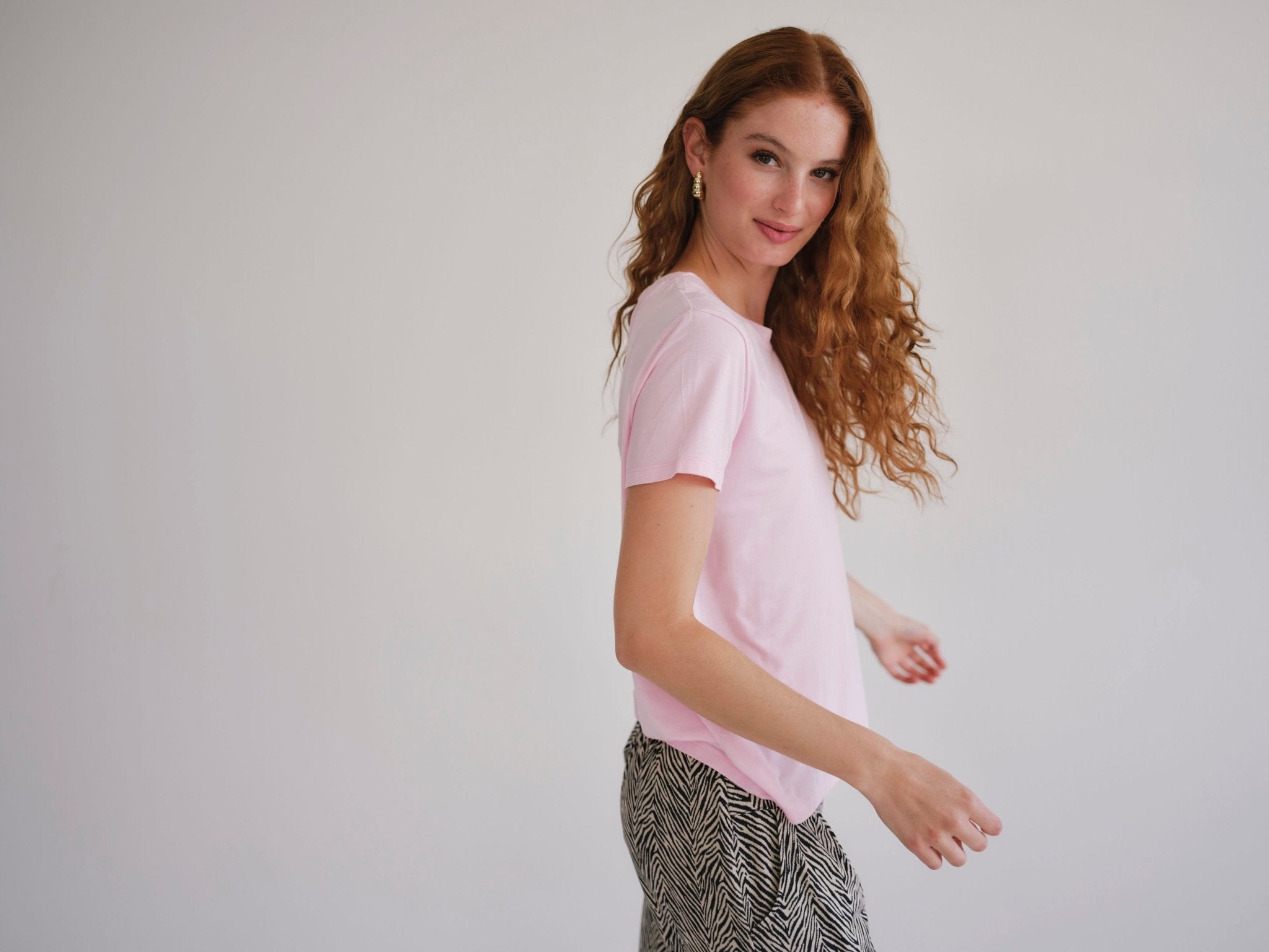 View our Butter Soft Summer Crew Neck Tee In Pink - by Tribute Store