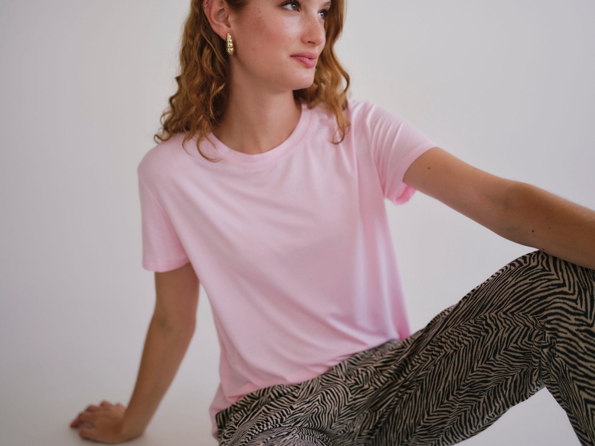 View our Butter Soft Summer Crew Neck Tee In Pink - by Tribute Store