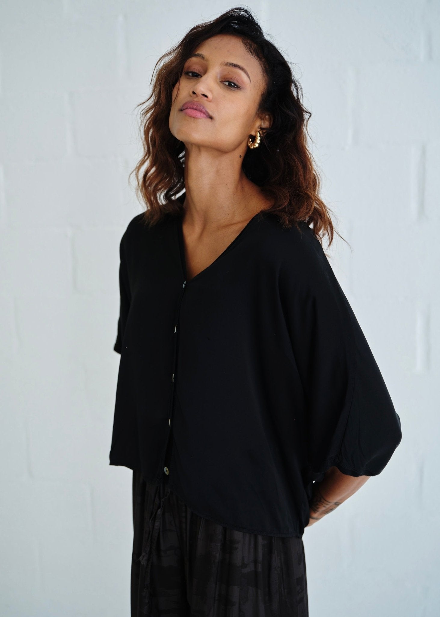 View our Button Up Cardi With 3/4 Sleeves In Black - by Tribute Store