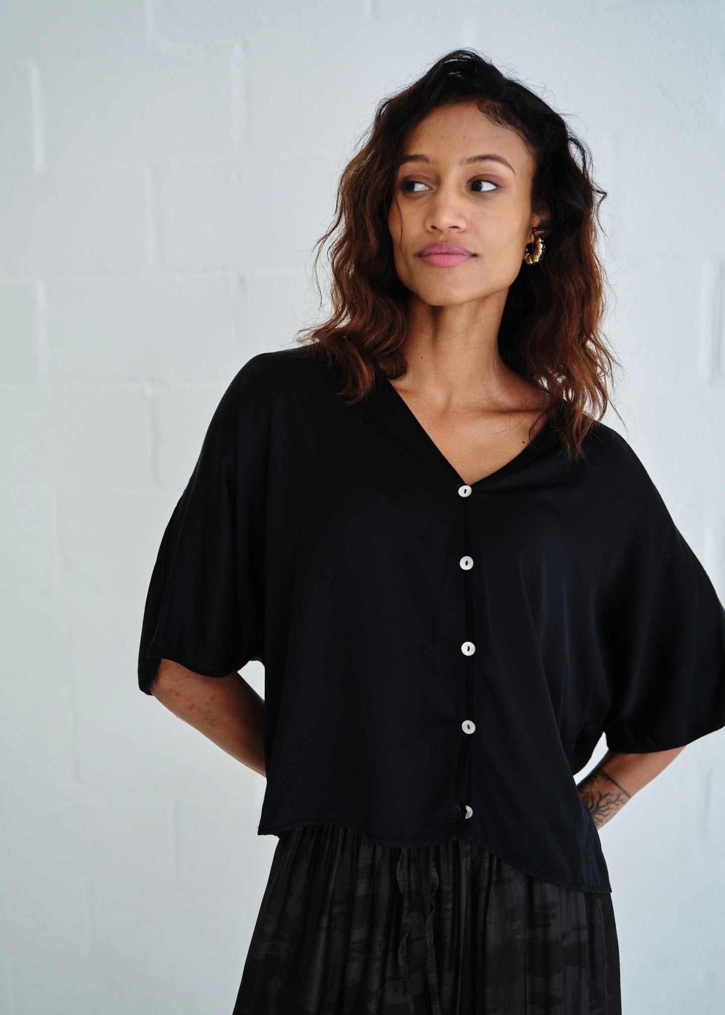 View our Button Up Cardi With 3/4 Sleeves In Black - by Tribute Store