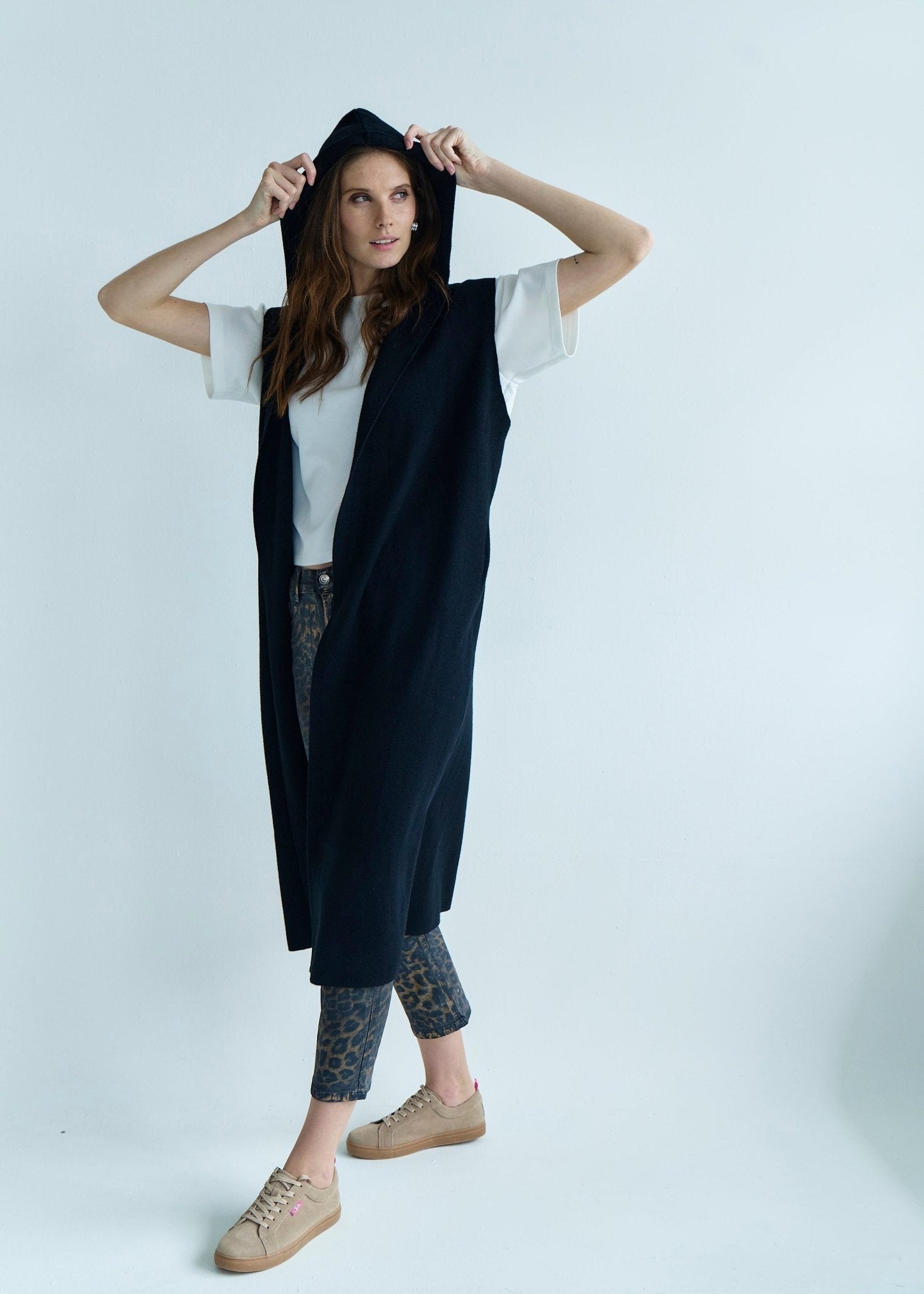 View our Camille Sleeveless Knitted Viscose Coat in Black - by Tribute Store