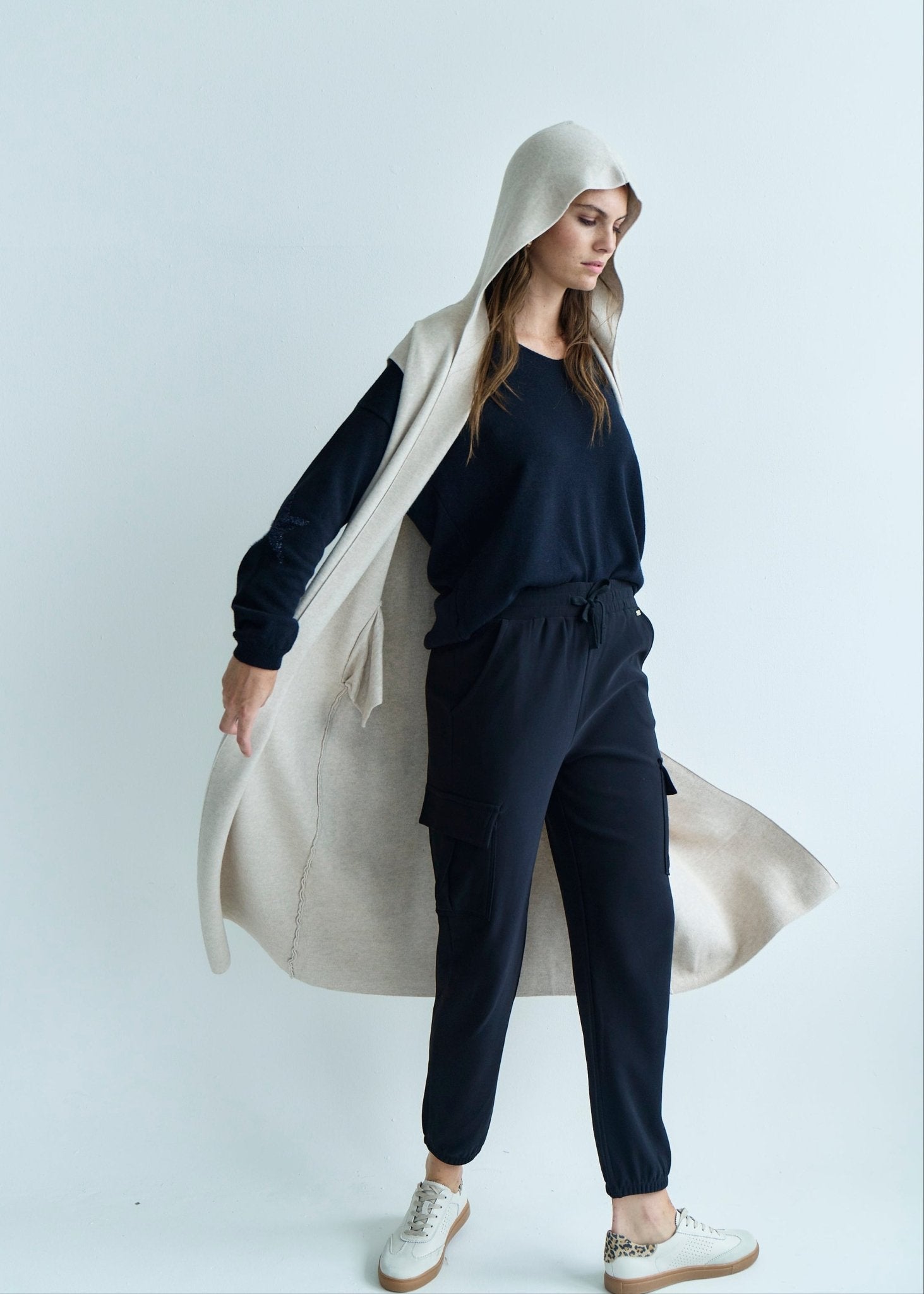 View our Camille Sleeveless Knitted Viscose Coat in Cream - by Tribute Store