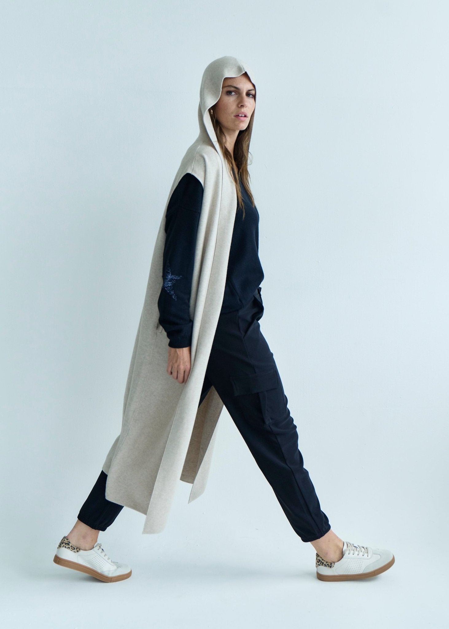 View our Camille Sleeveless Knitted Viscose Coat in Cream - by Tribute Store