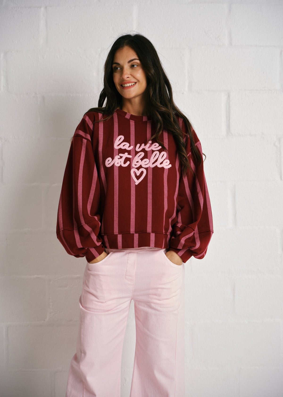 View our Cannes La Vie Est Belle Striped Sweatshirt In Burgundy Pink - by Tribute Store