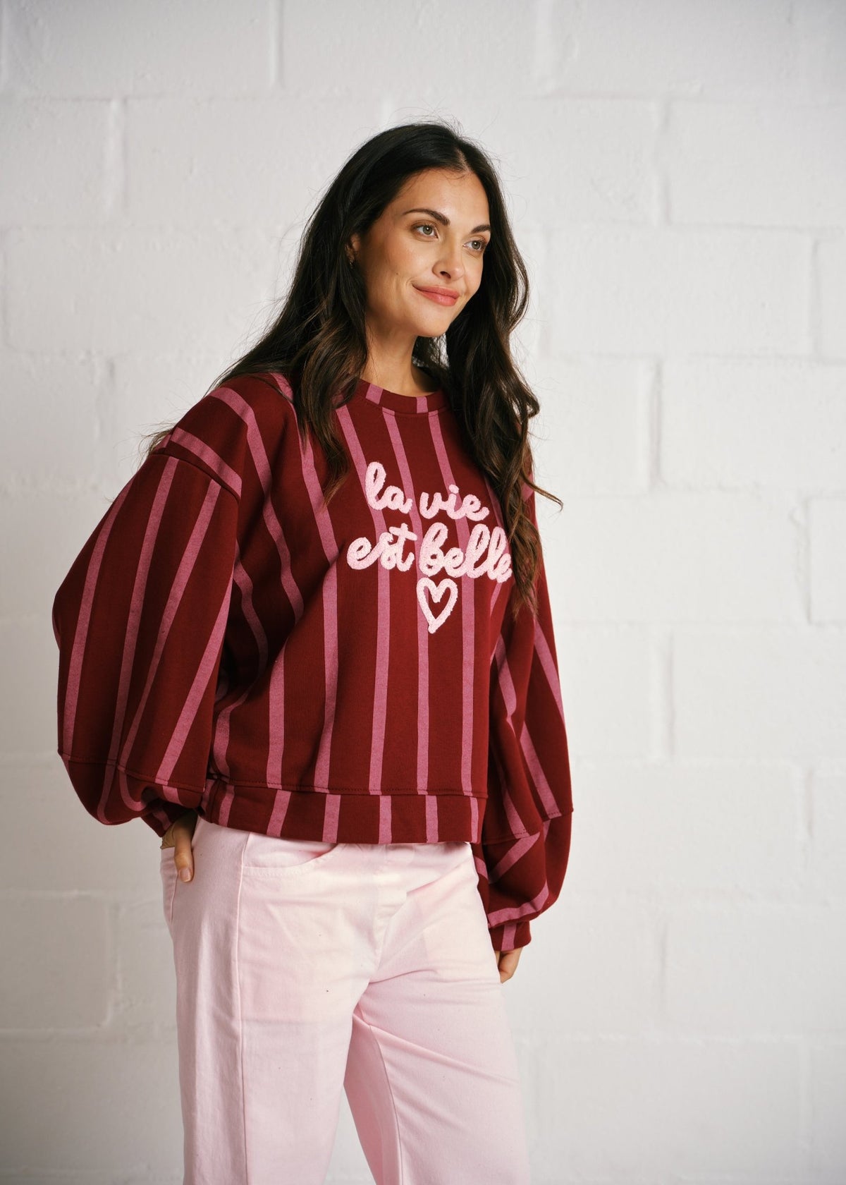 View our Cannes La Vie Est Belle Striped Sweatshirt In Burgundy Pink - by Tribute Store