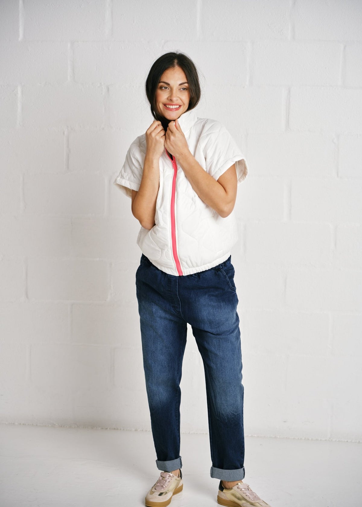 View our Cortina Quilted Short Sleeve Puffer Jacket With Pink Zip In White - by Tribute Store