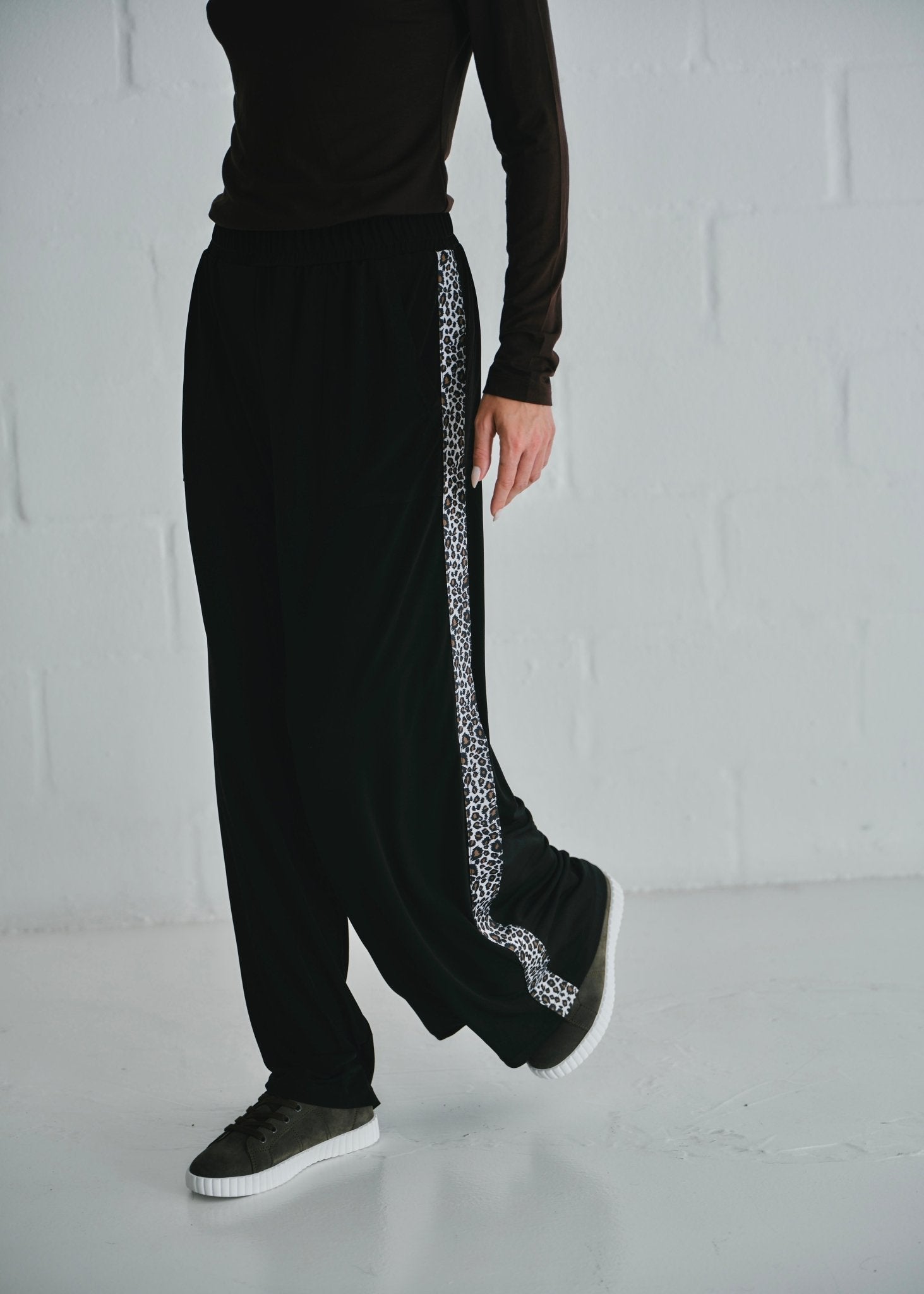 View our Ella Wide Leg Pants In Black With Animal Print - by Tribute Store