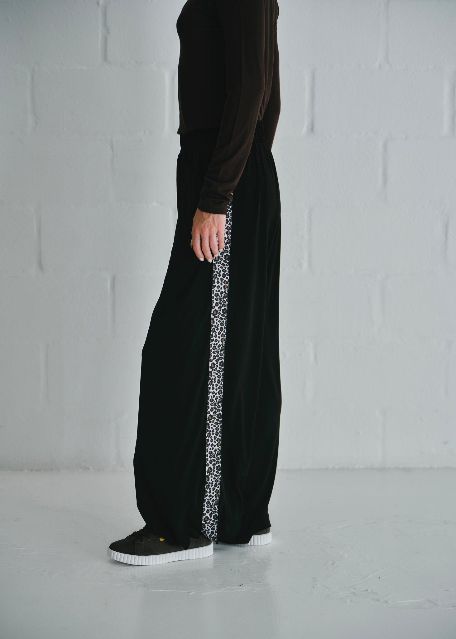 View our Ella Wide Leg Pants In Black With Animal Print - by Tribute Store