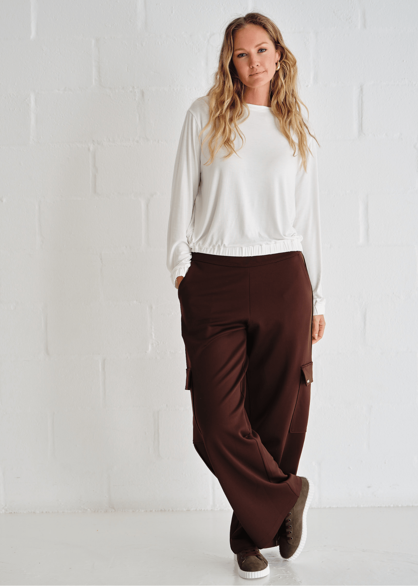 View our Eve Elasticated Hem Top In White - by Tribute Store