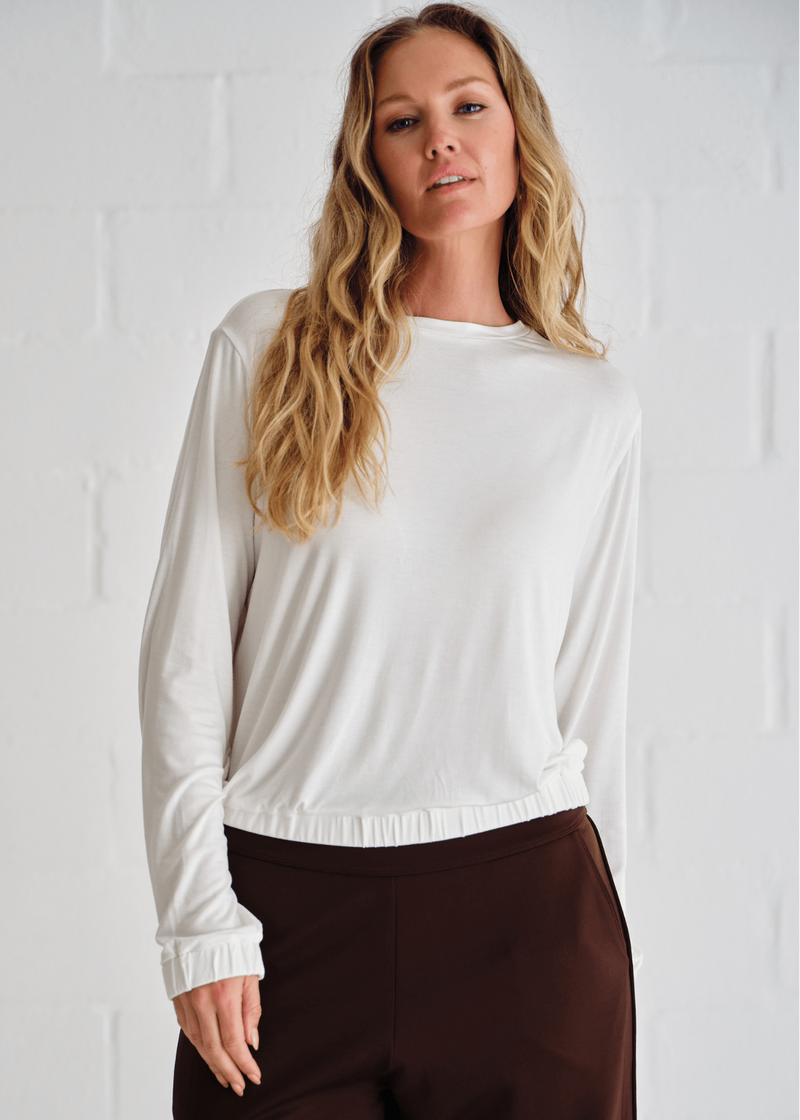 View our Eve Elasticated Hem Top In White - by Tribute Store