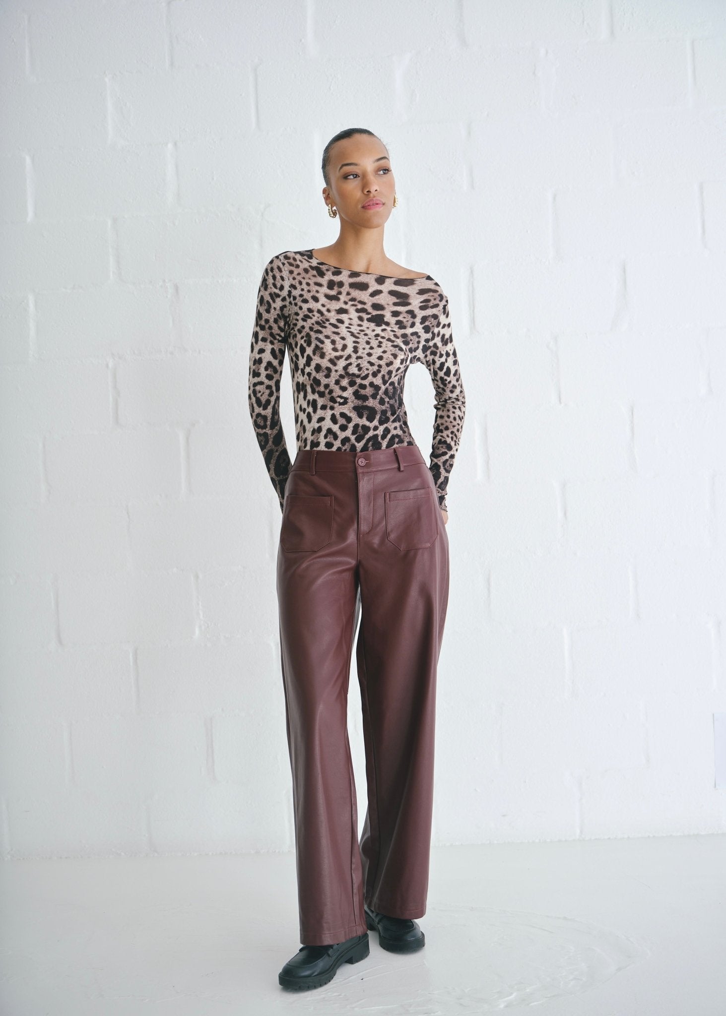 View our Faux Leather Wide Leg Trousers In Burgundy - by Tribute Store