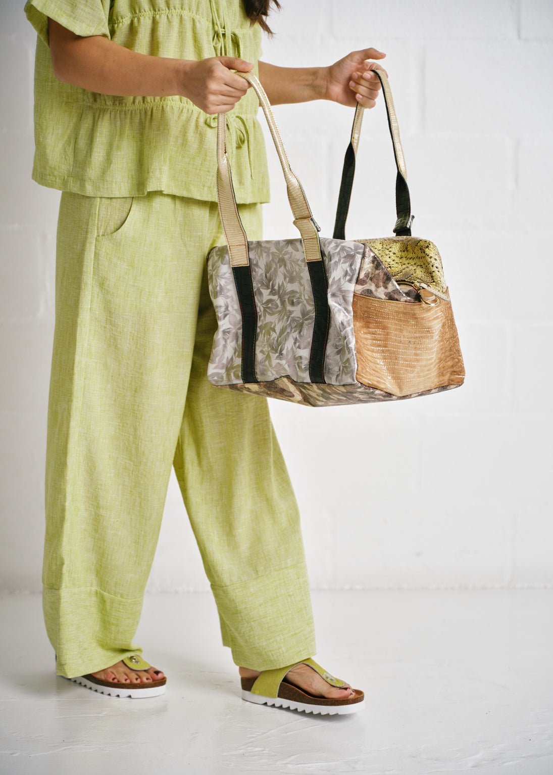 View our Genuine Leather Textured Travel Bag - by Tribute Store