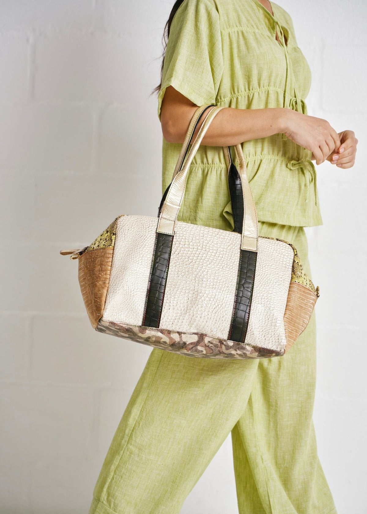 View our Genuine Leather Textured Travel Bag - by Tribute Store
