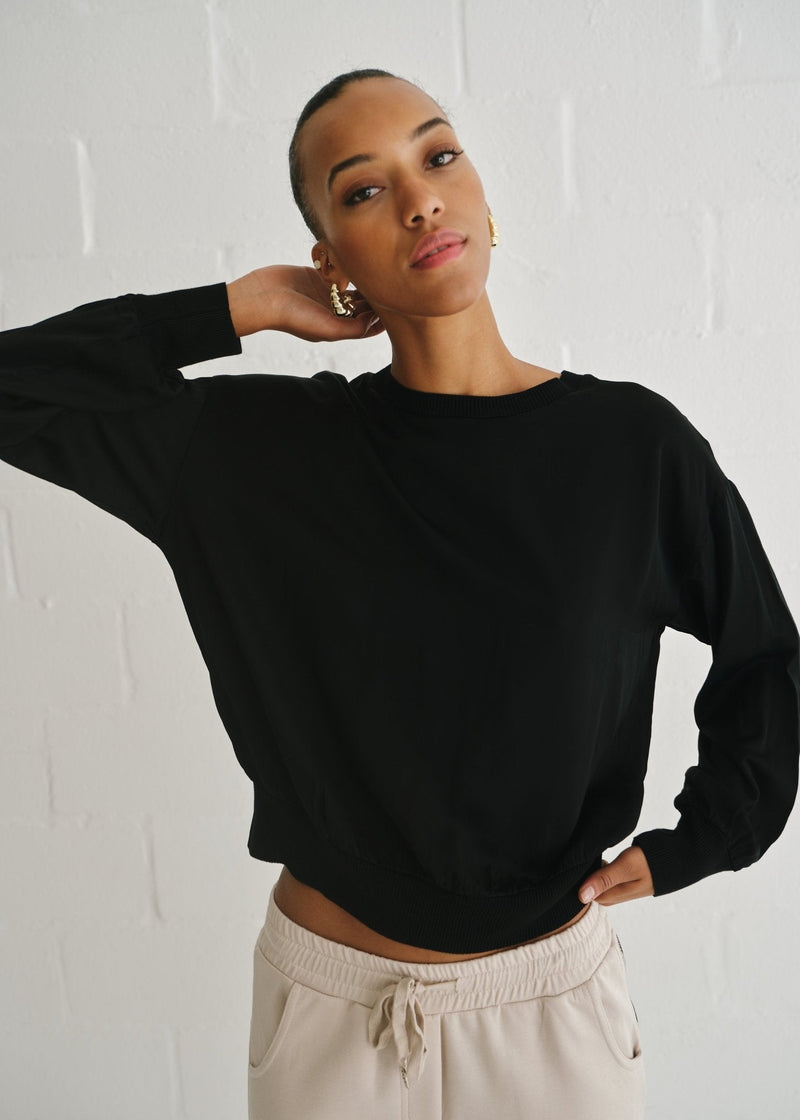 View our Italian Crew Neck Satin Long Sleeved Top In Black - by Tribute Store