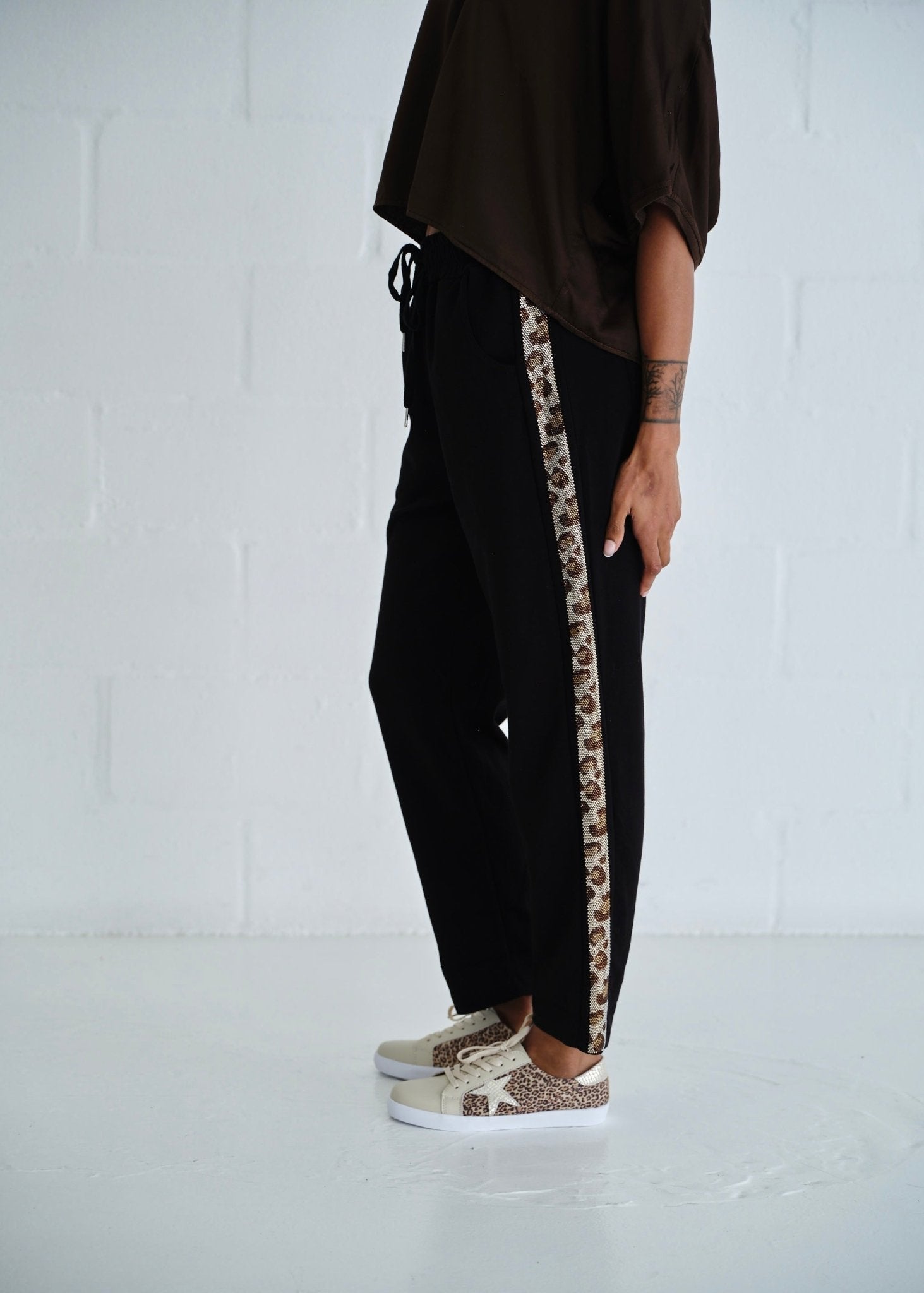 View our Italian Joggers with Sparkle Leopard Diamantés In Black - by Tribute Store