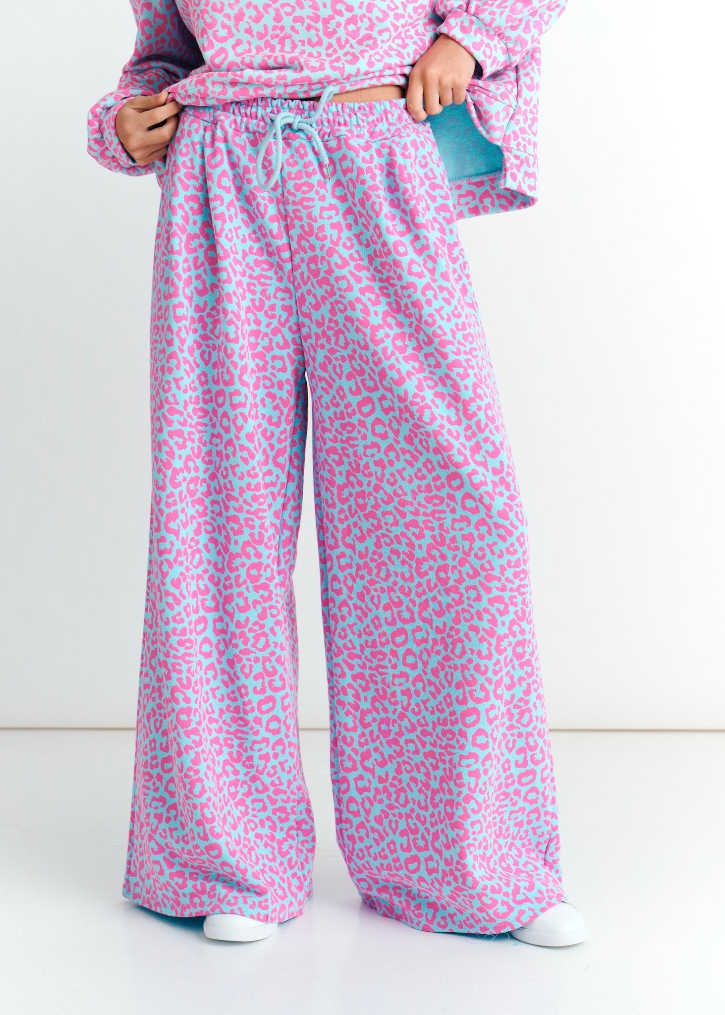 View our Italian Leopard Track Pants In Light Blue and Pink - by Tribute Store