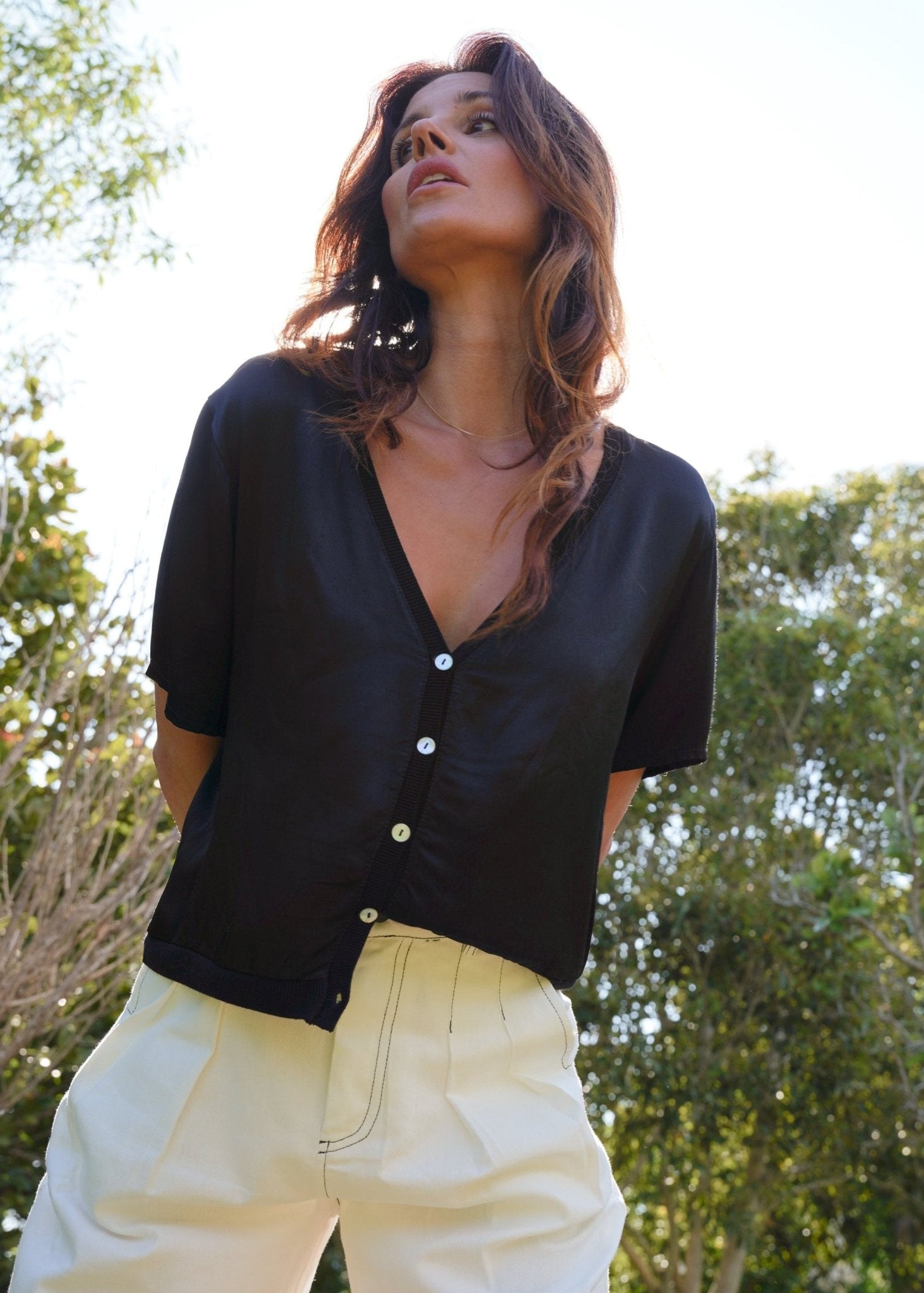 View our Italian Satin Blouse With V and front Buttons In Black - by Tribute Store