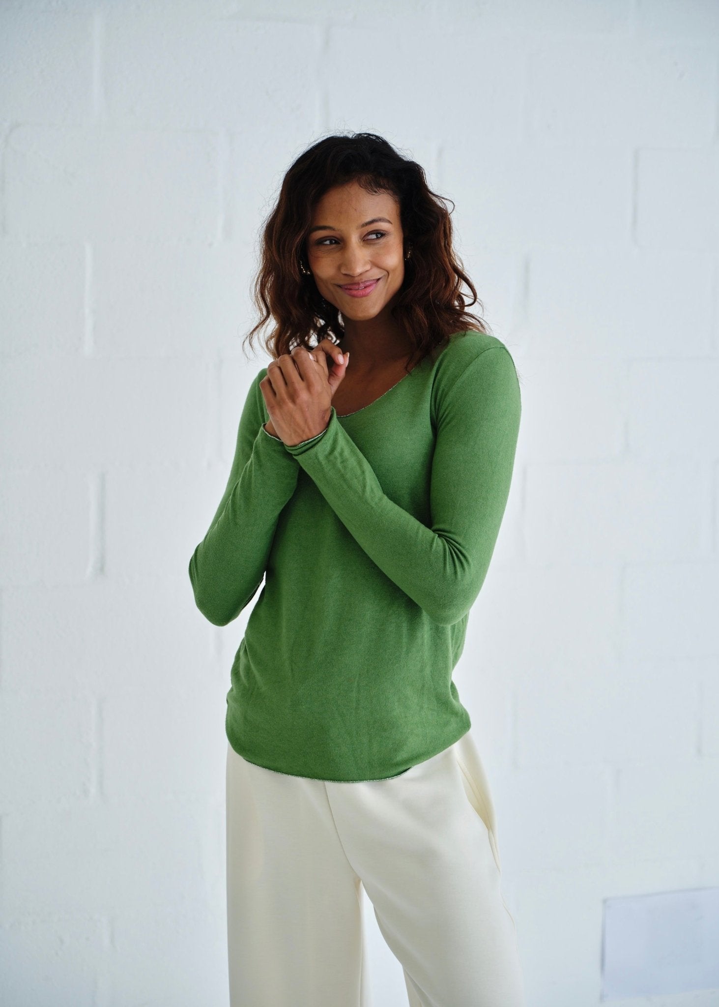 View our Italian Shimmer Edged V Neck Knit In Dark Green - by Tribute Store