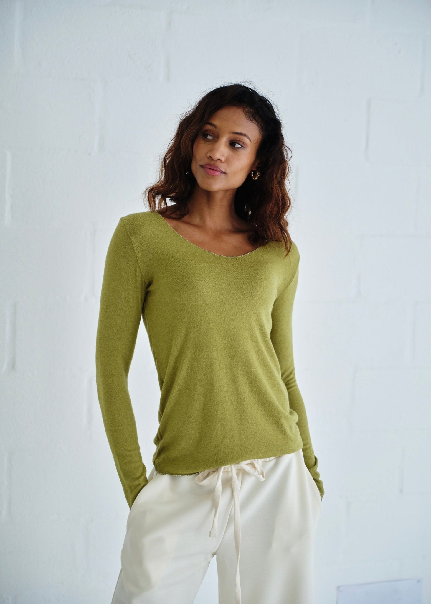 View our Italian Shimmer Edged V Neck Knit In Olive Green - by Tribute Store