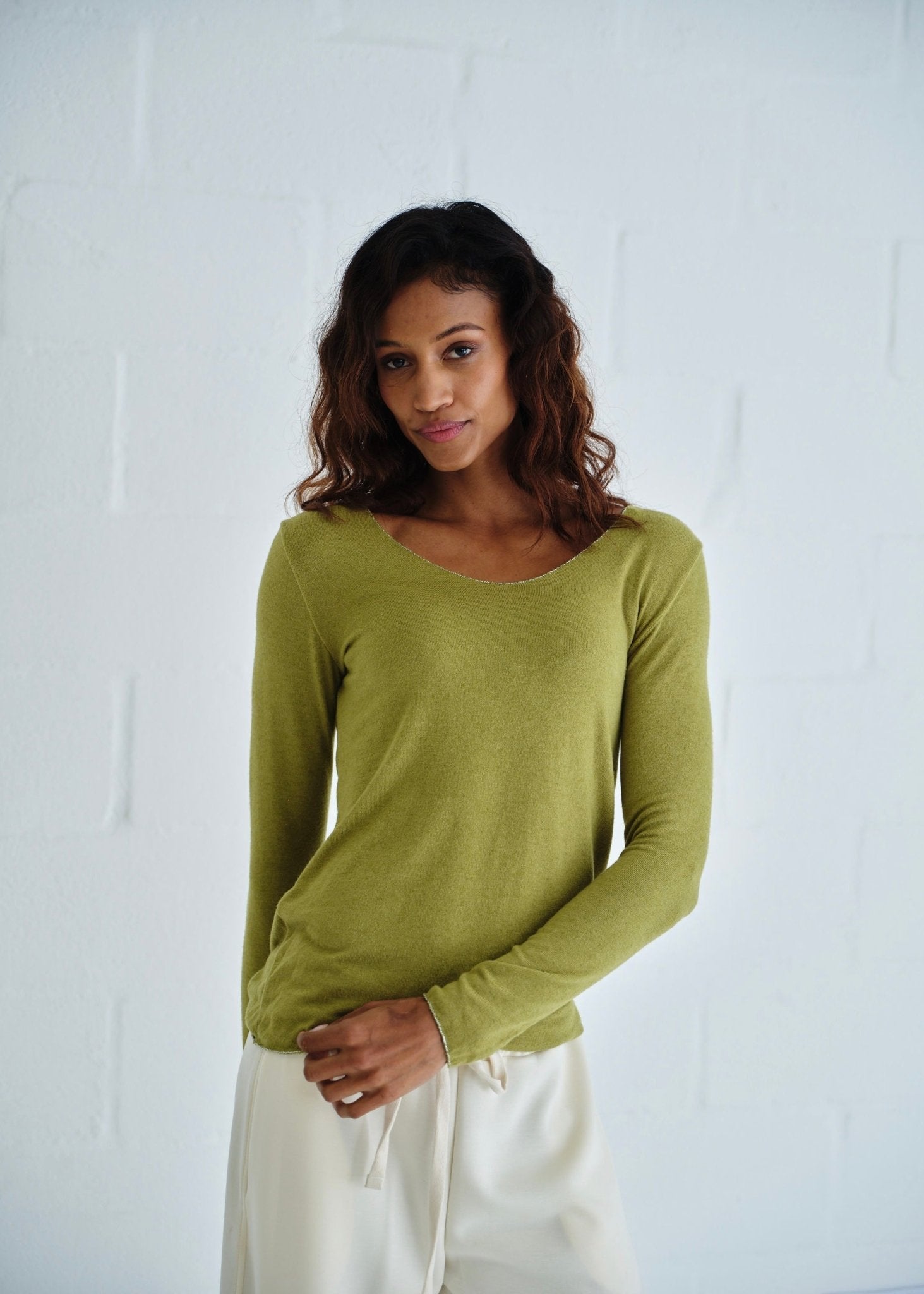 View our Italian Shimmer Edged V Neck Knit In Olive Green - by Tribute Store
