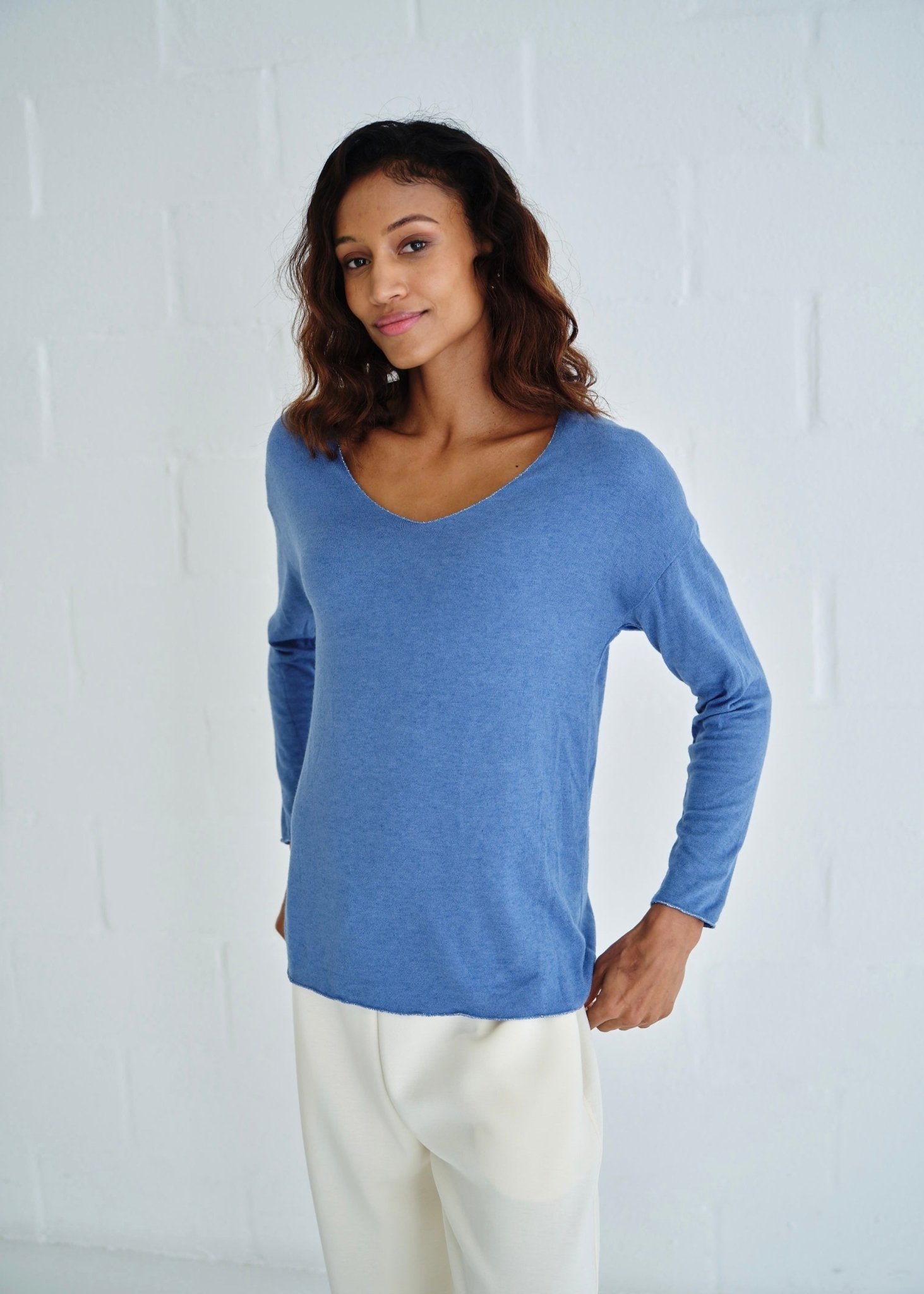 View our Italian Shimmer Edged V Neck Knit In Sky Blue - by Tribute Store