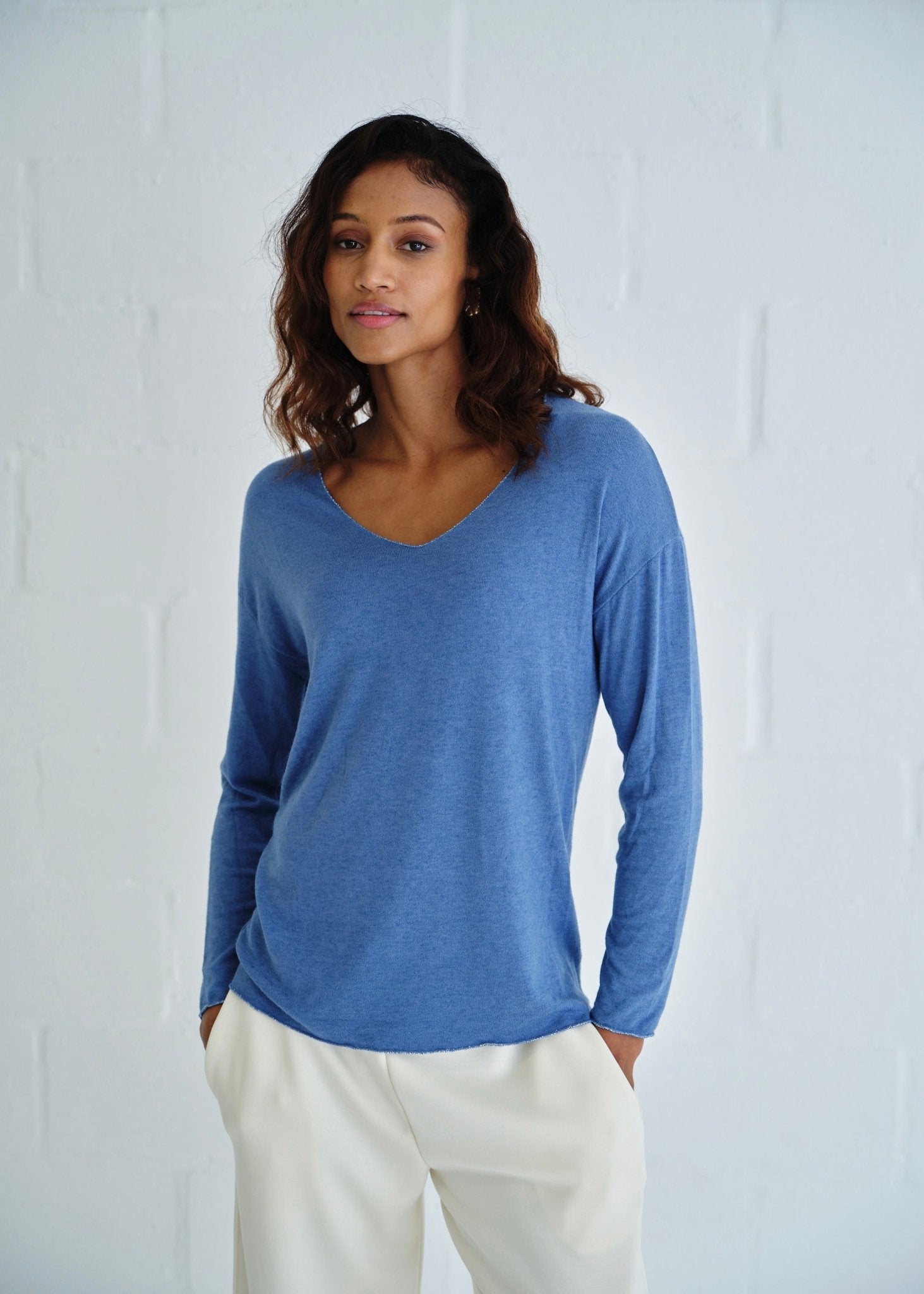 View our Italian Shimmer Edged V Neck Knit In Sky Blue - by Tribute Store