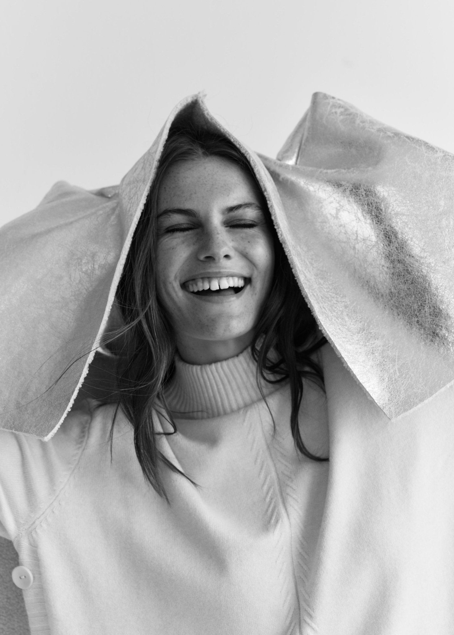 View our Italian Sleeveless Sherpa Coat with Silver Shimmer In Grey - by Tribute Store