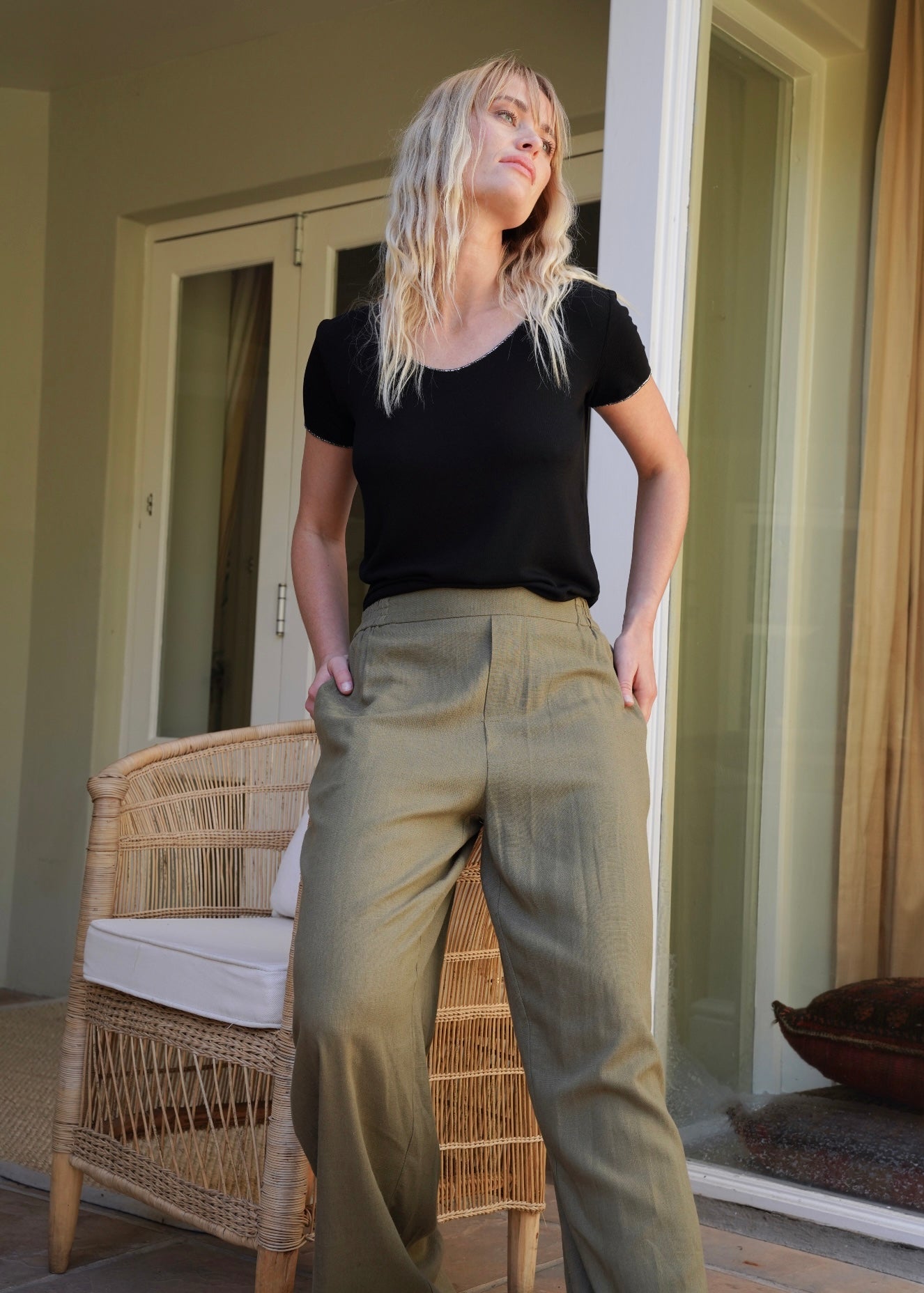 View our Italian Stonewashed Shimmer Edged Knitted Fitted Tee In Black - by Tribute Store