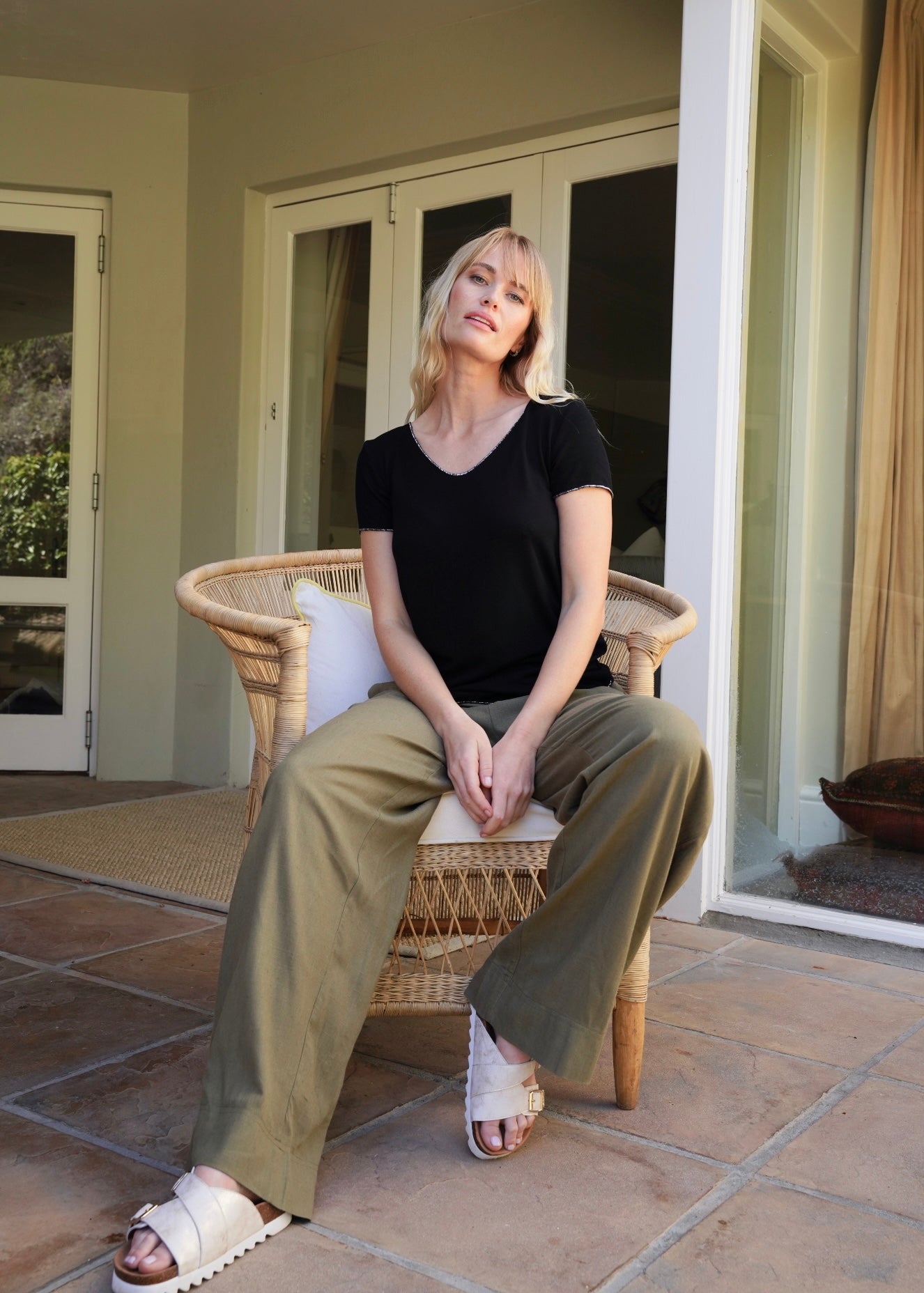 View our Italian Stonewashed Shimmer Edged Knitted Fitted Tee In Black - by Tribute Store