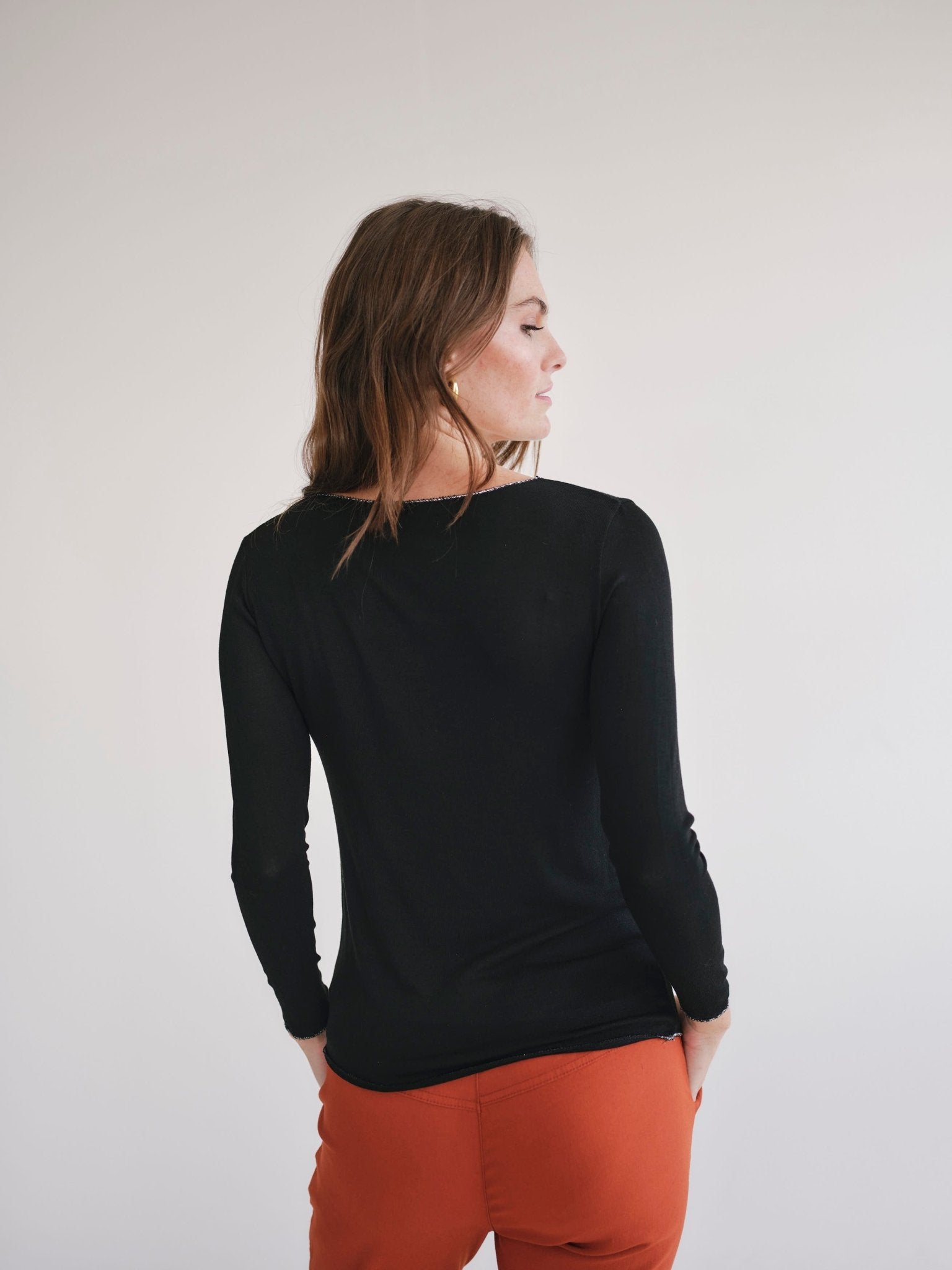 View our Italian V Neck Knit with Shimmer Edge in Black - by Tribute Store