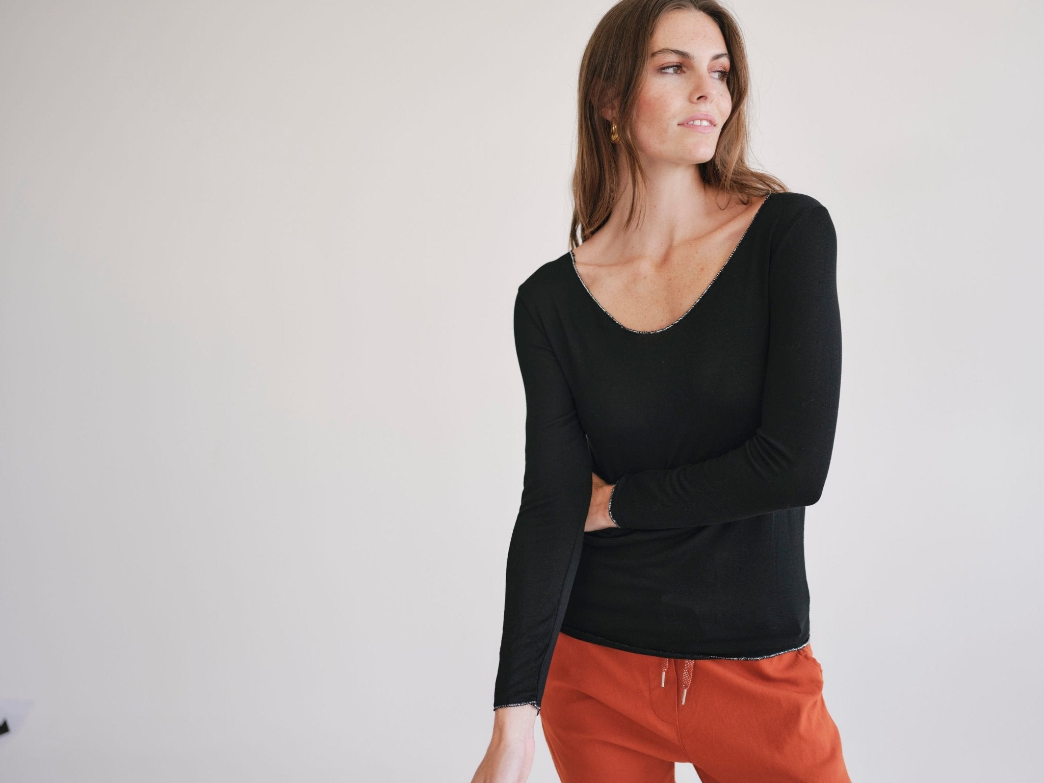 View our Italian V Neck Knit with Shimmer Edge in Black - by Tribute Store