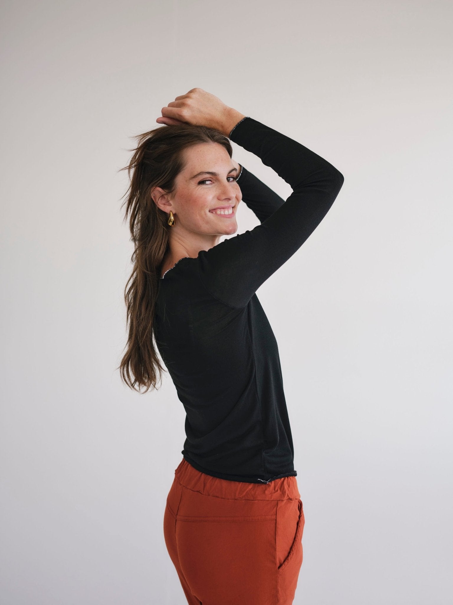 View our Italian V Neck Knit with Shimmer Edge in Black - by Tribute Store