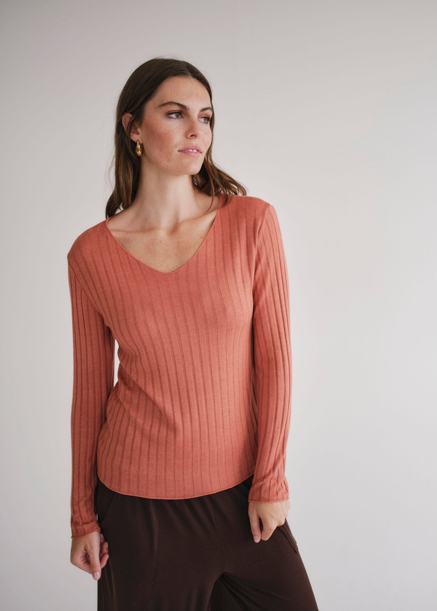 View our Italian V Neck Rib Knit in Rust - by Tribute Store