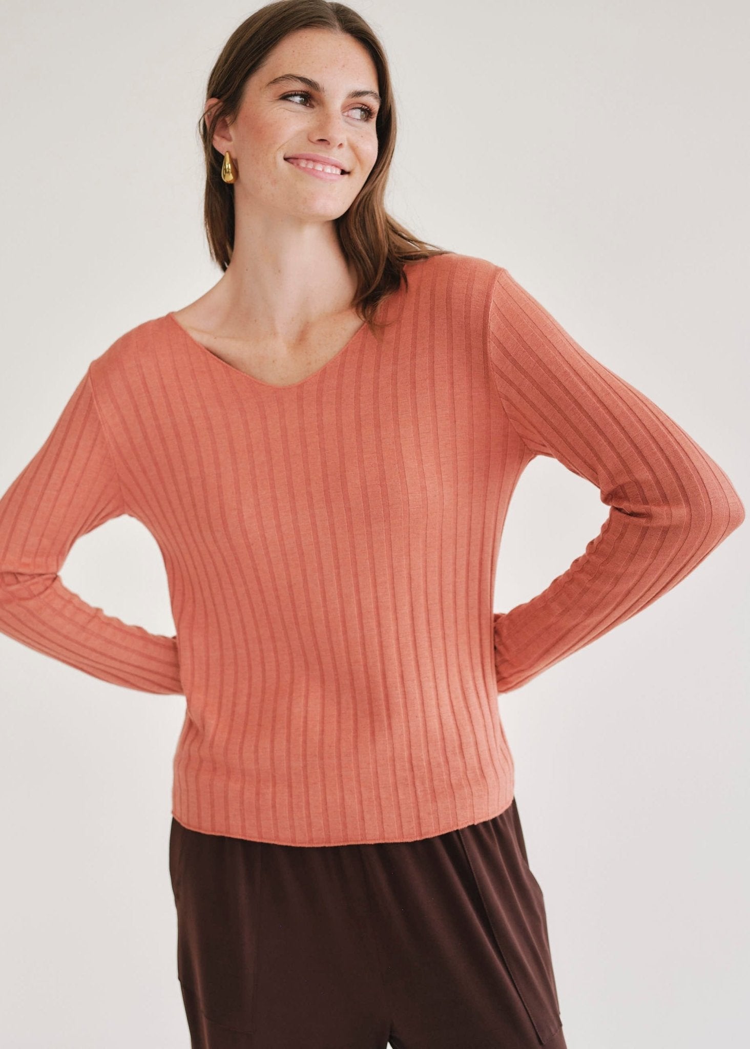 View our Italian V Neck Rib Knit in Rust - by Tribute Store