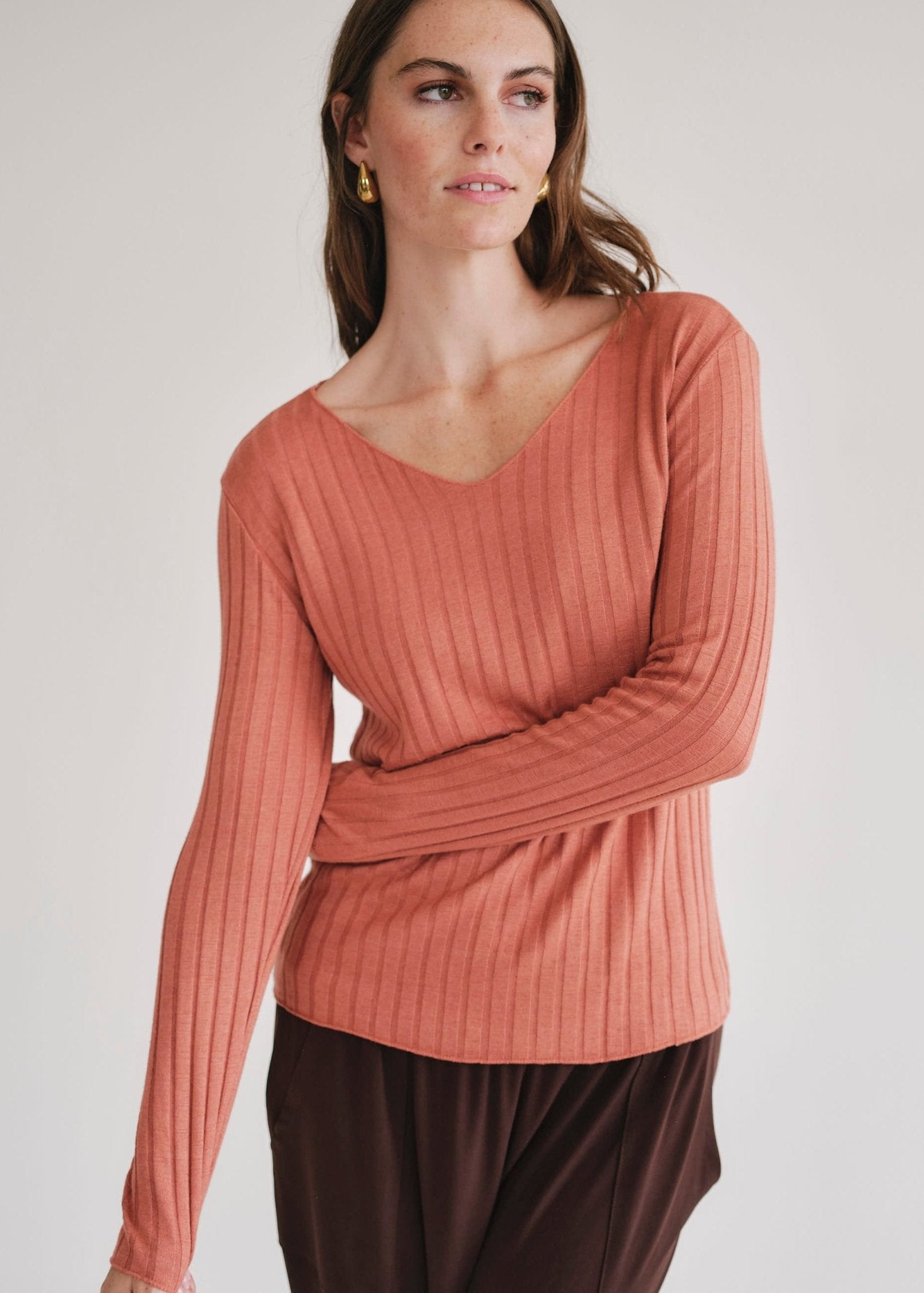 View our Italian V Neck Rib Knit in Rust - by Tribute Store