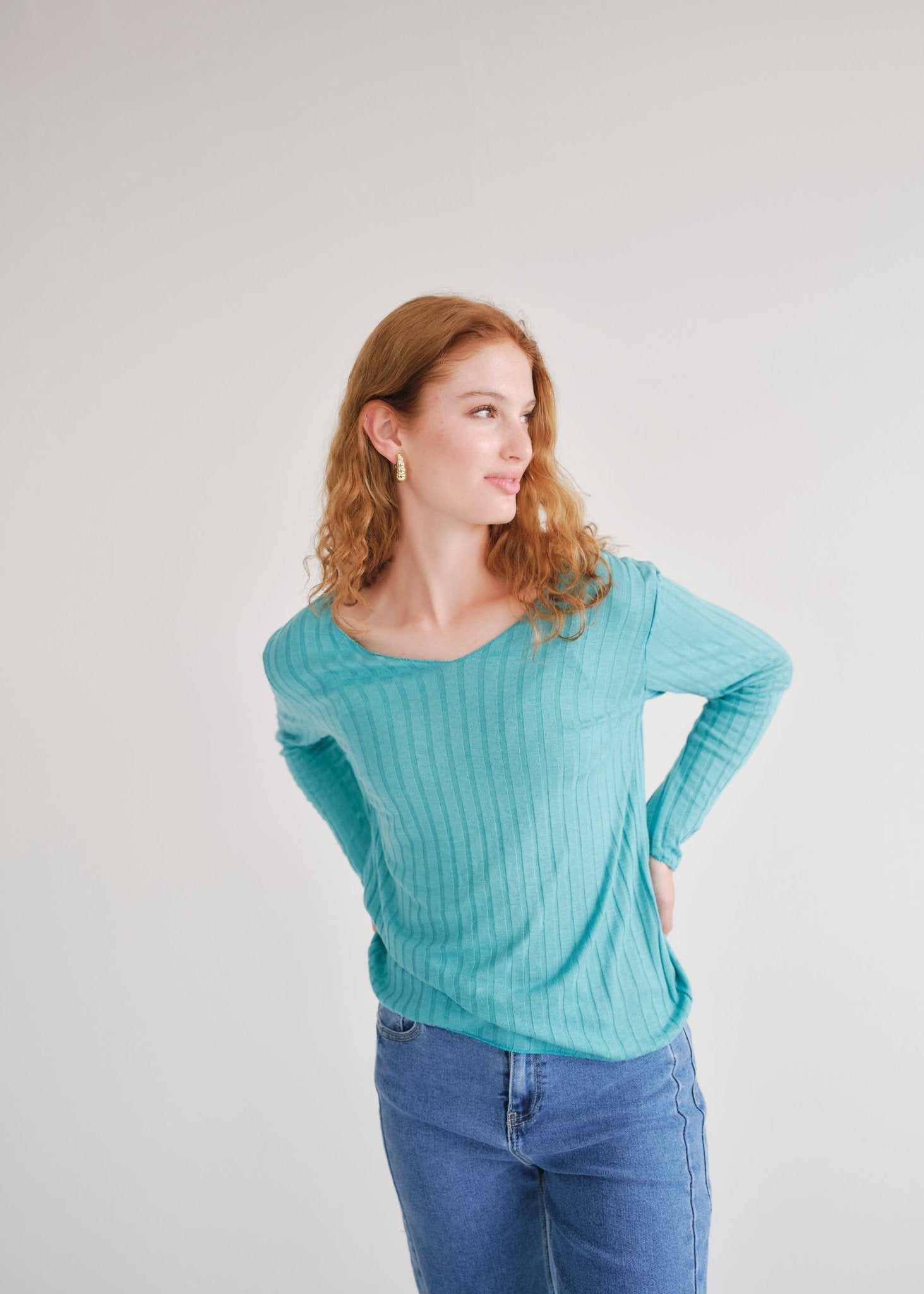 View our Italian V Neck Rib Knit in Turquoise - by Tribute Store