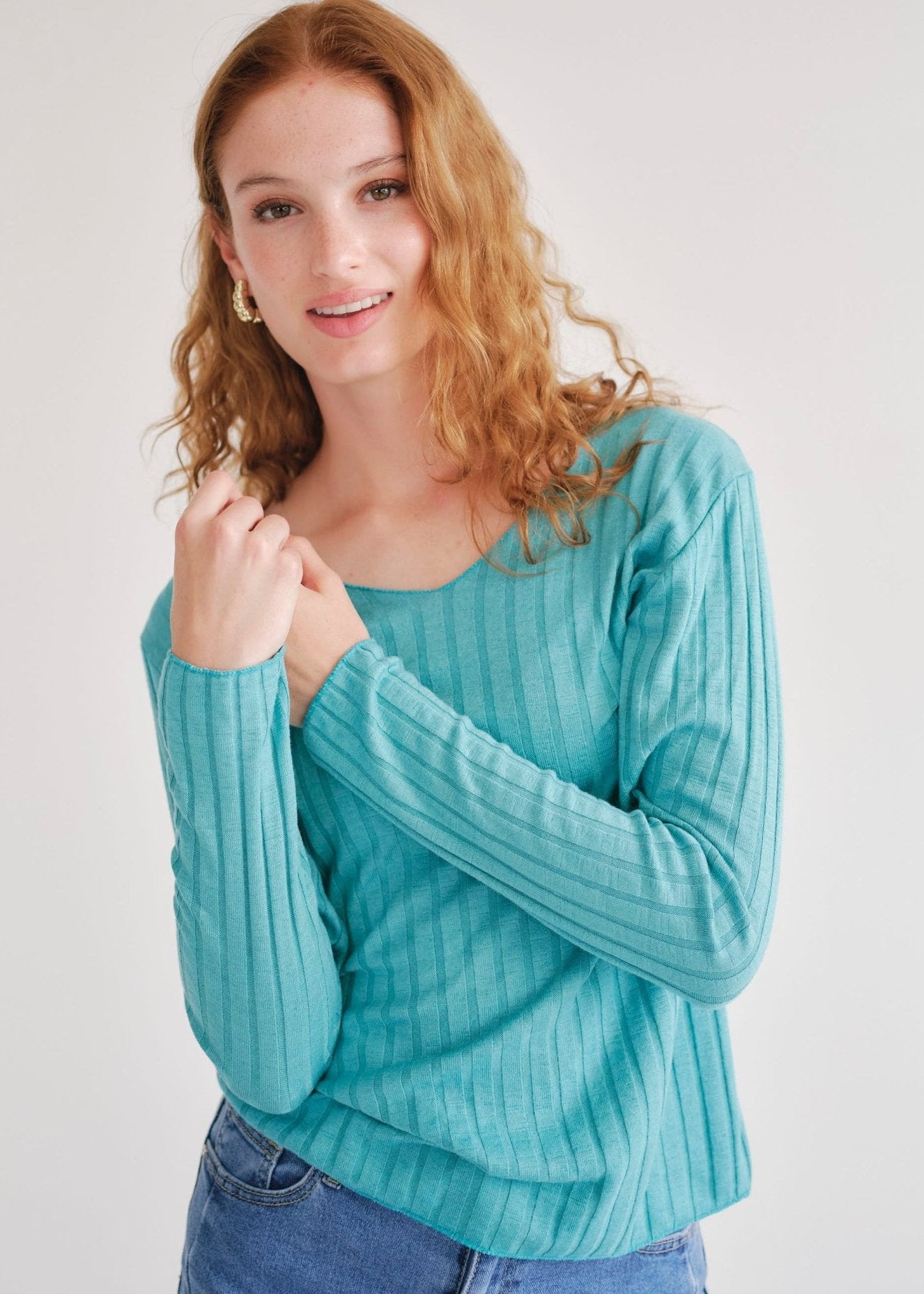 View our Italian V Neck Rib Knit in Turquoise - by Tribute Store