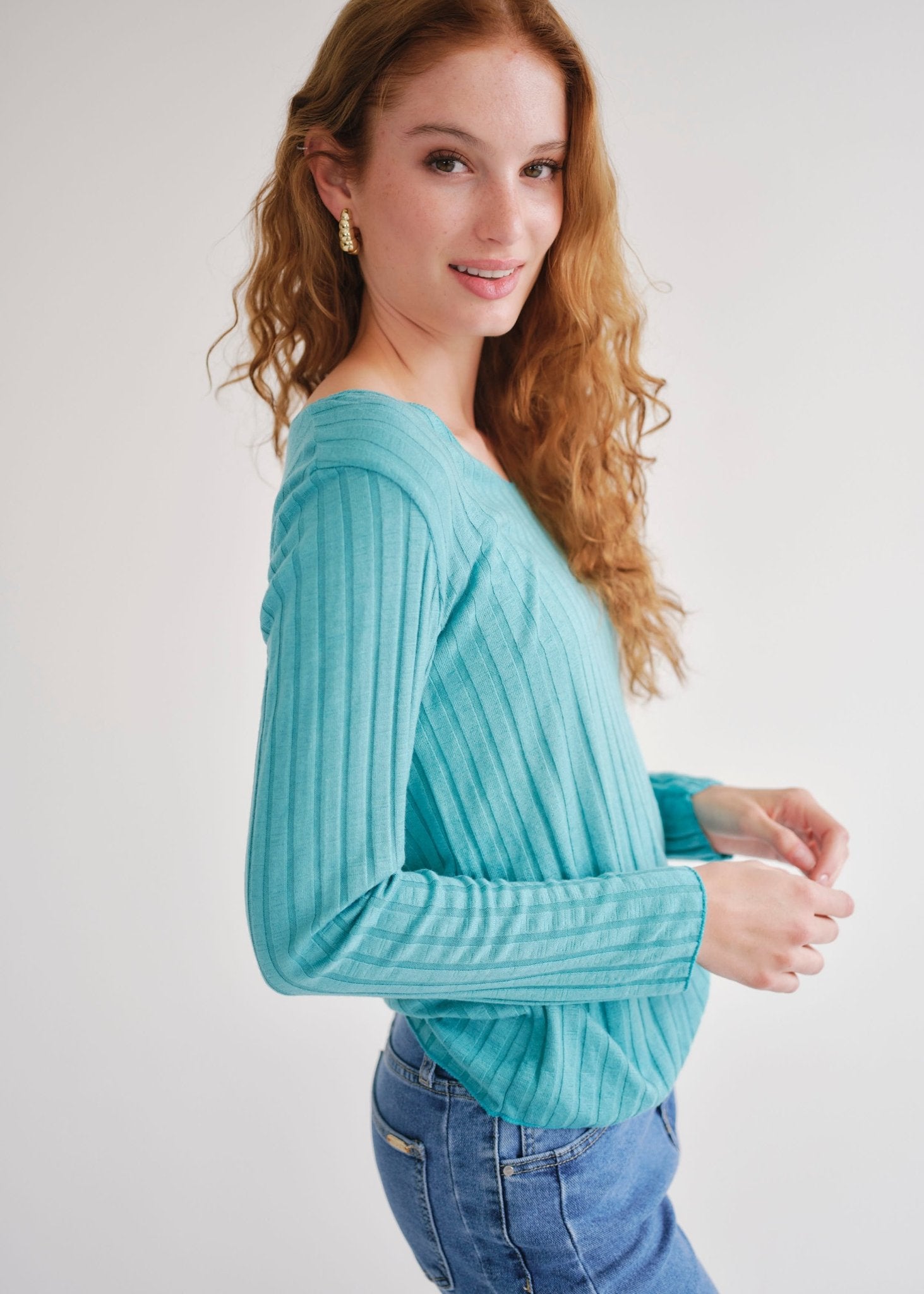 View our Italian V Neck Rib Knit in Turquoise - by Tribute Store