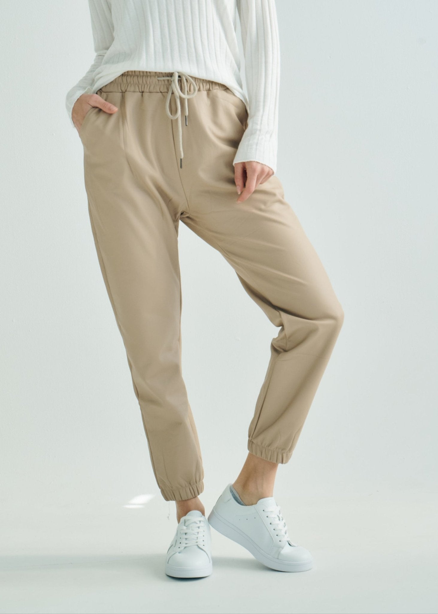 View our Jagger Vegan Leather Joggers in Beige - by Tribute Store