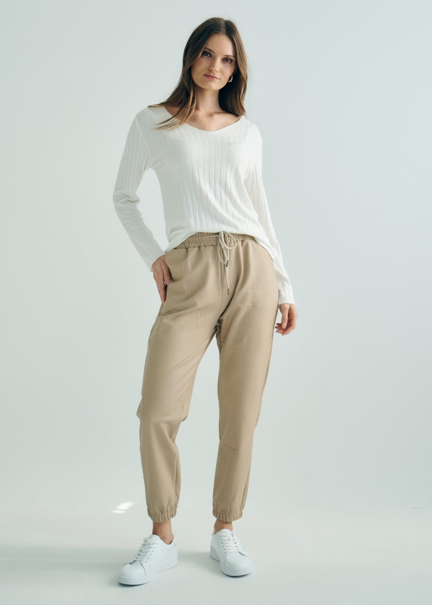 View our Jagger Vegan Leather Joggers in Beige - by Tribute Store