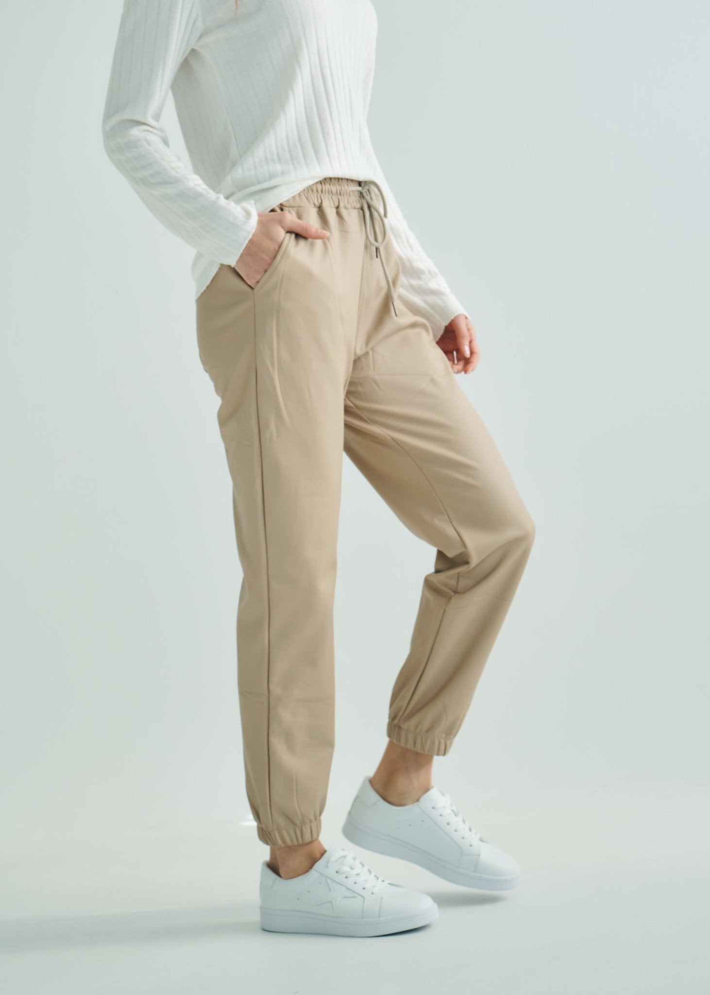 View our Jagger Vegan Leather Joggers in Beige - by Tribute Store