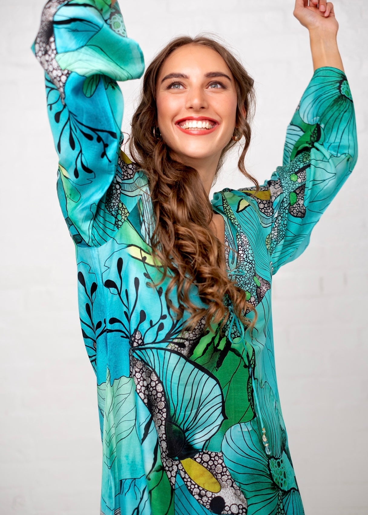 View our Lanira Dress in Green and Turquoise Flower Print - by Tribute Store