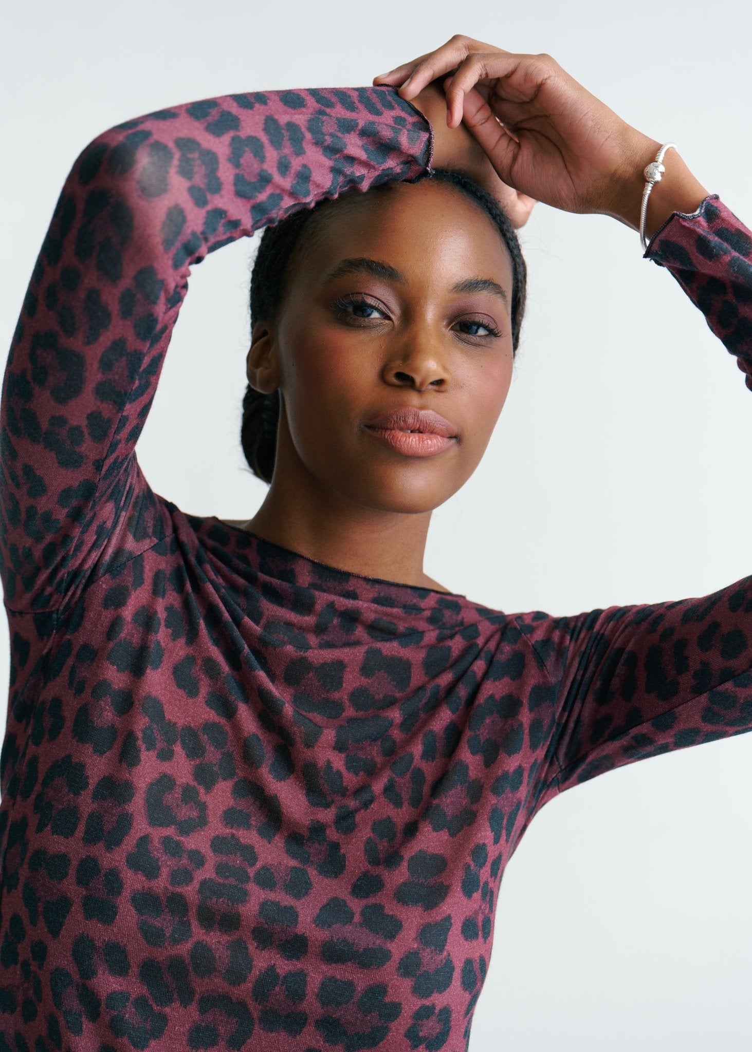 View our Leah Italian Cashmere Blend Sheer Top In Maroon With Big Leopard Print - by Tribute Store