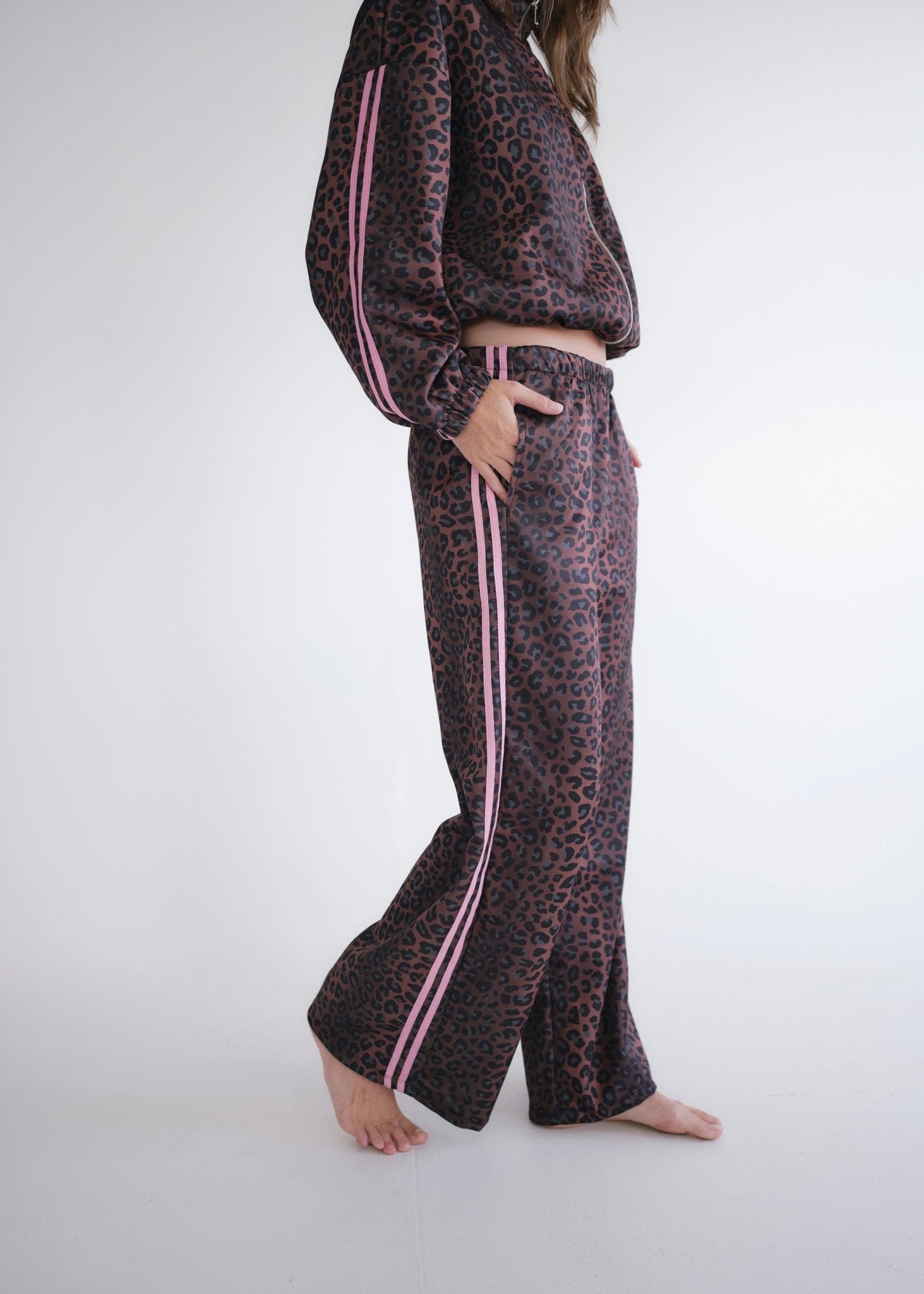 View our Leopard Rose Track Pants - by Tribute Store
