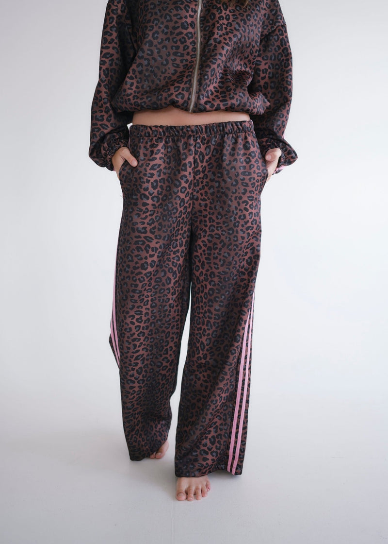 View our Leopard Rose Track Pants - by Tribute Store
