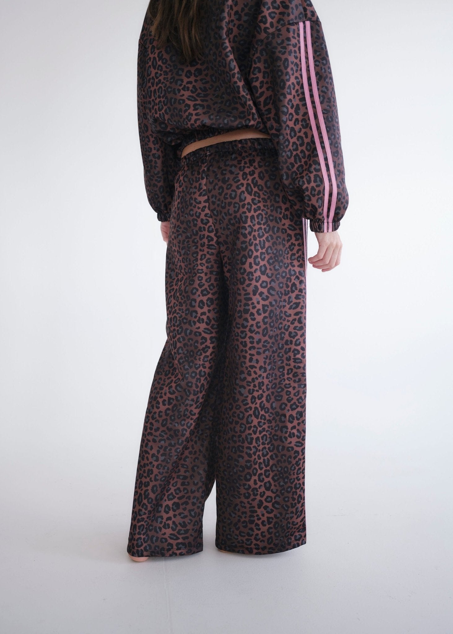 View our Leopard Rose Track Pants - by Tribute Store