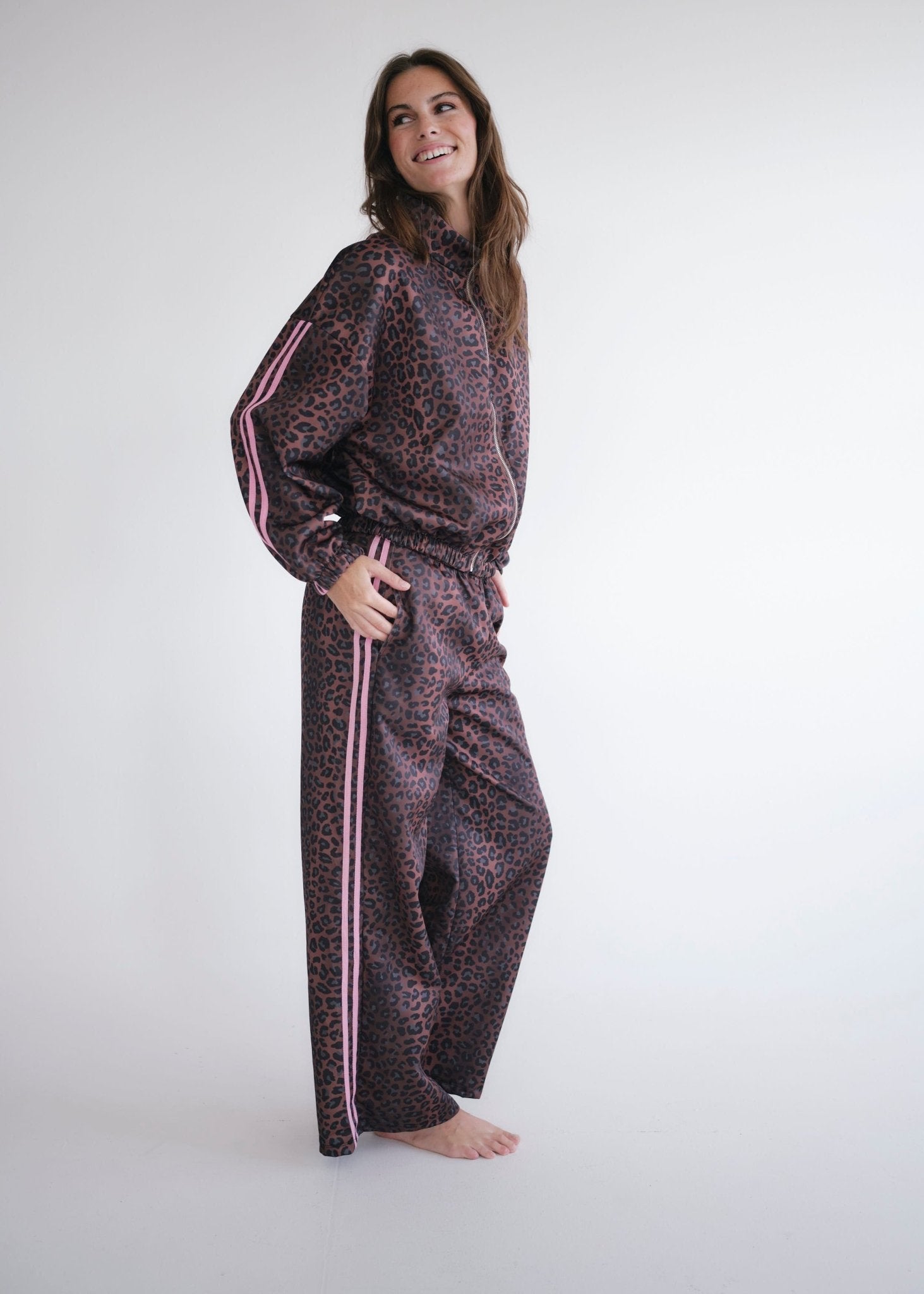 View our Leopard Rose Track Pants - by Tribute Store