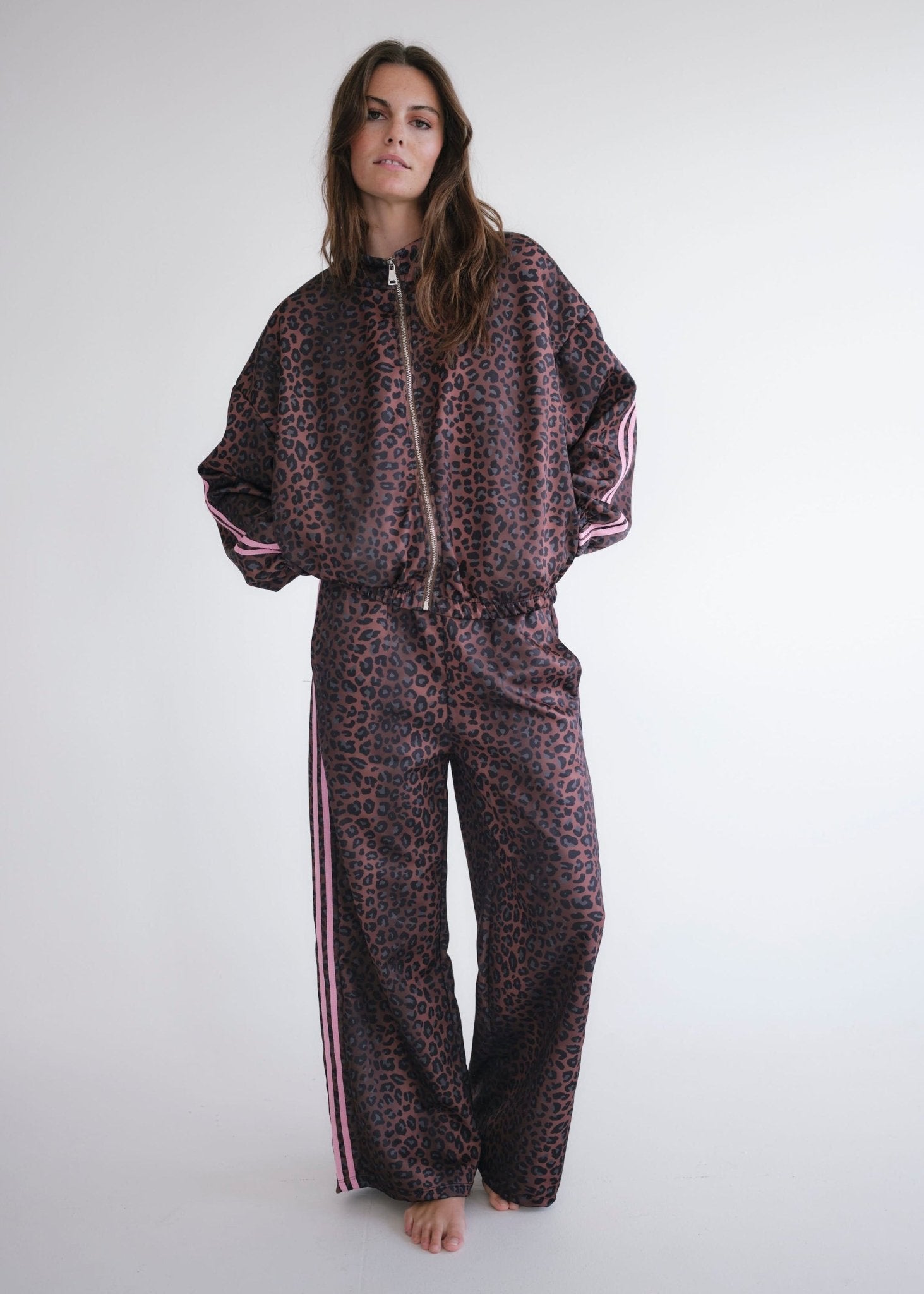 View our Leopard Rose Track Pants - by Tribute Store