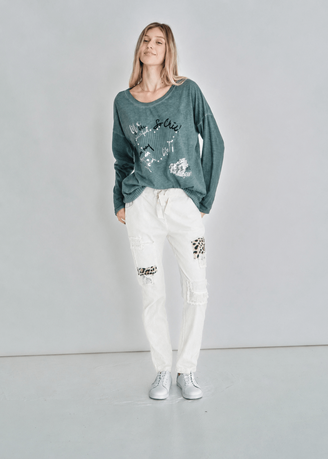 View our Leopard Sequin Joggers In White - by Tribute Store